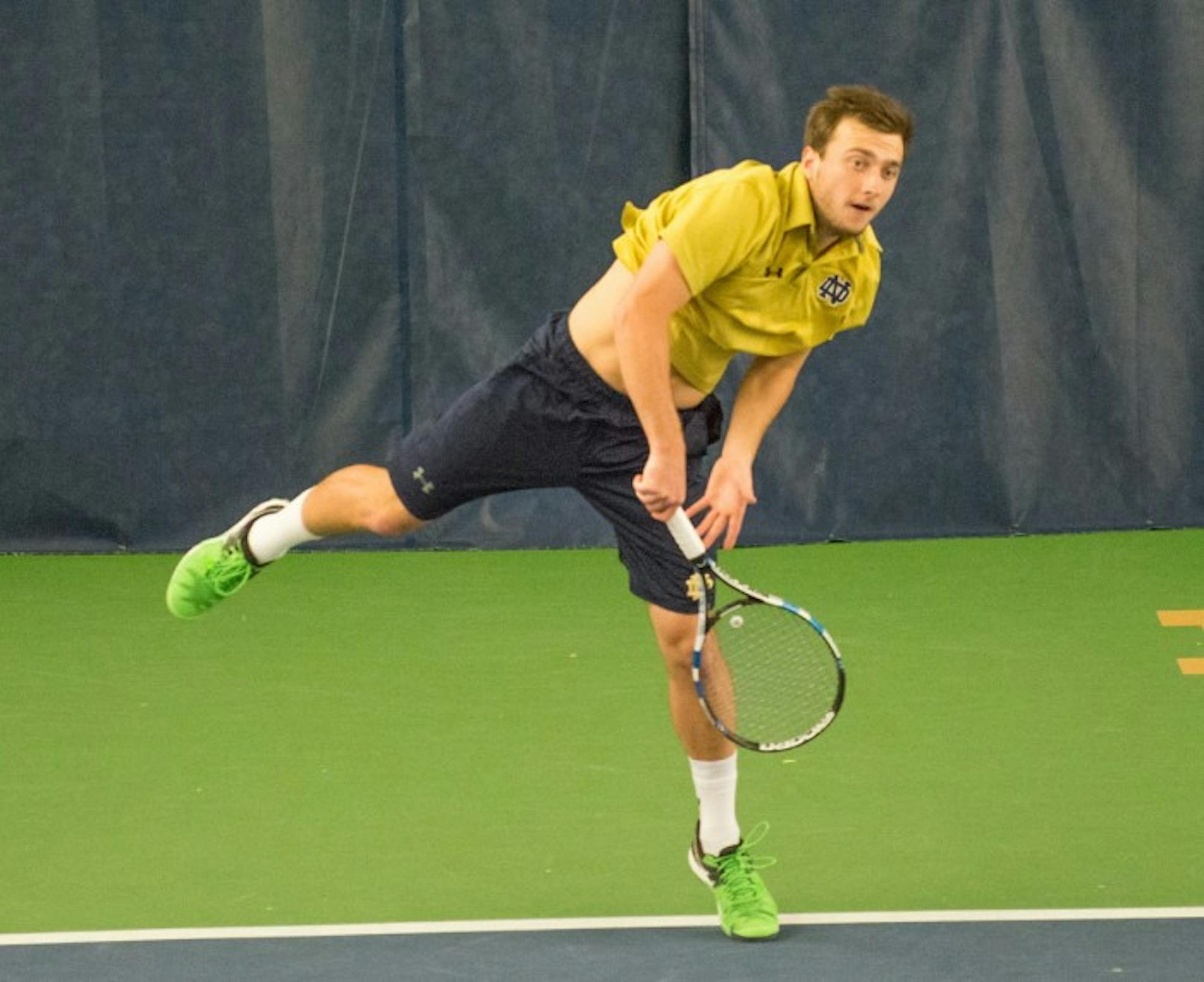 Irish senior Eddy Covalschi fires a shot over the net during Notre Dame’s 5-2 win over Duke on March 18 at Eck Tennis Pavilion.