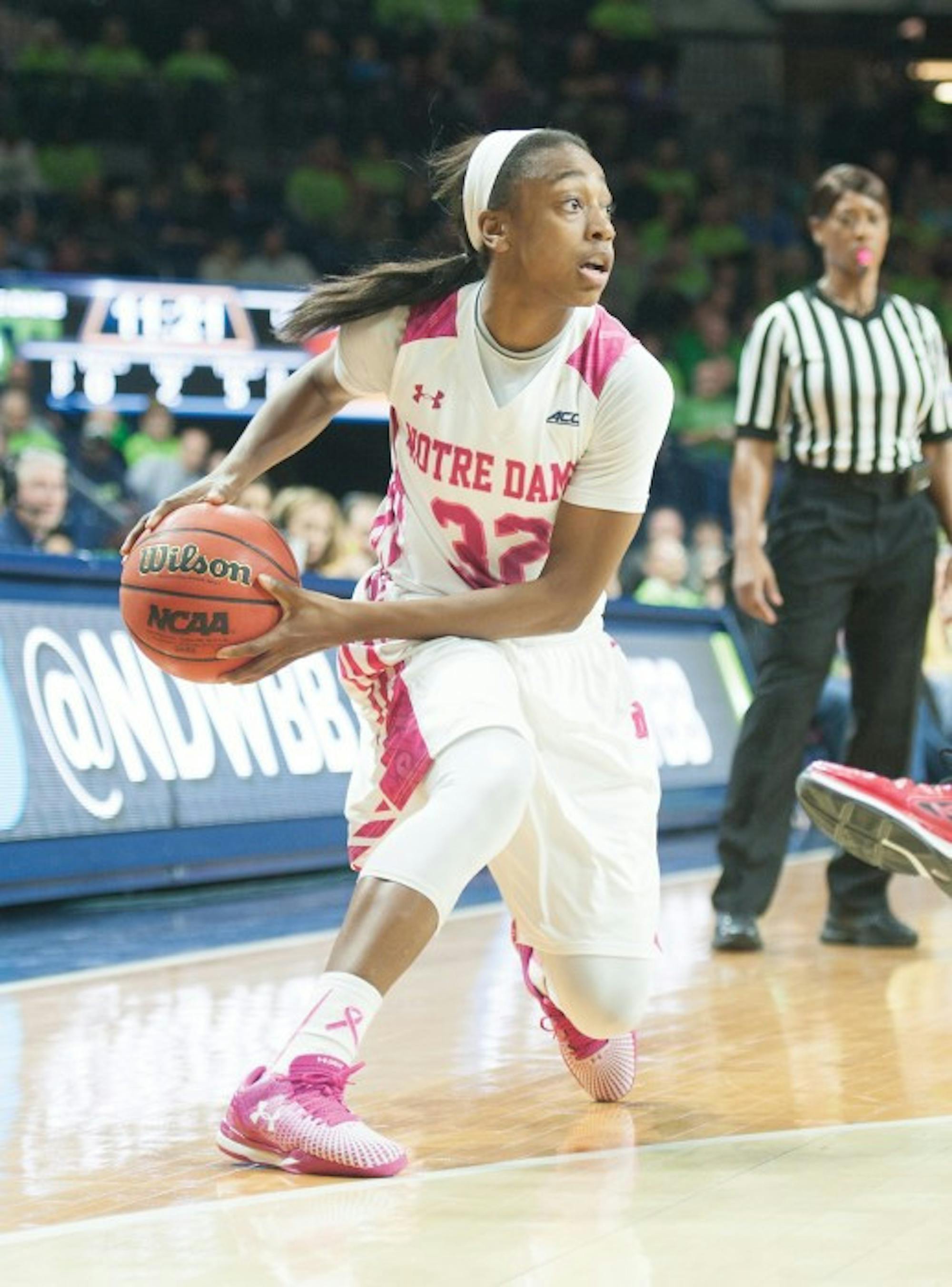 Irish junior guard Jewell Loyd makes a cut during Notre Dame's win over Louisville on Feb. 26.