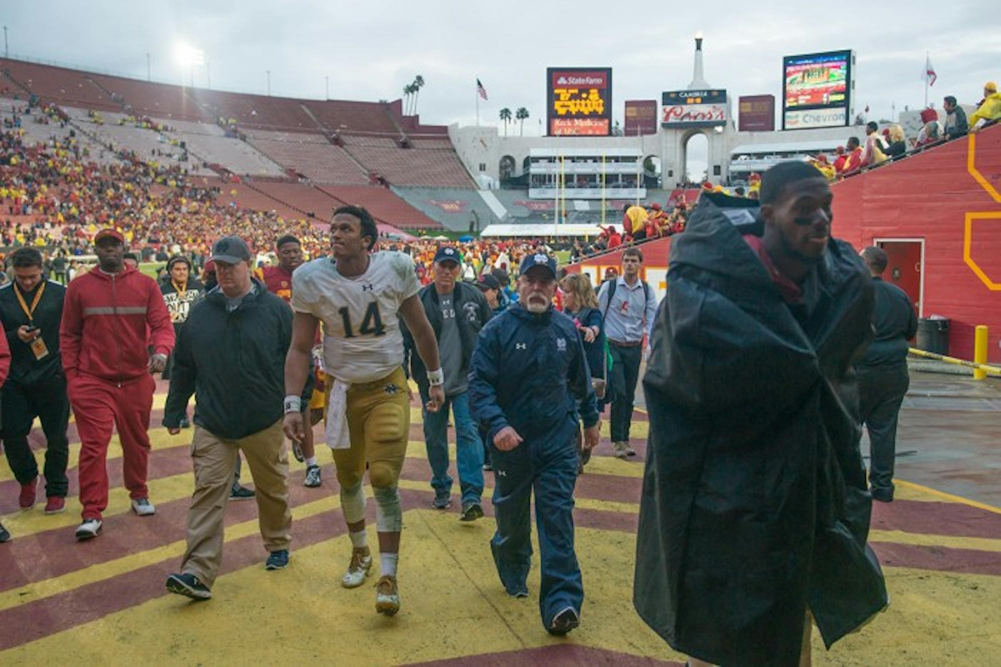 Irish junior quarterback DeShone Kizer walks up the tunnel at the Coliseum after Notre Dame's 45-27 loss to USC on Saturday.