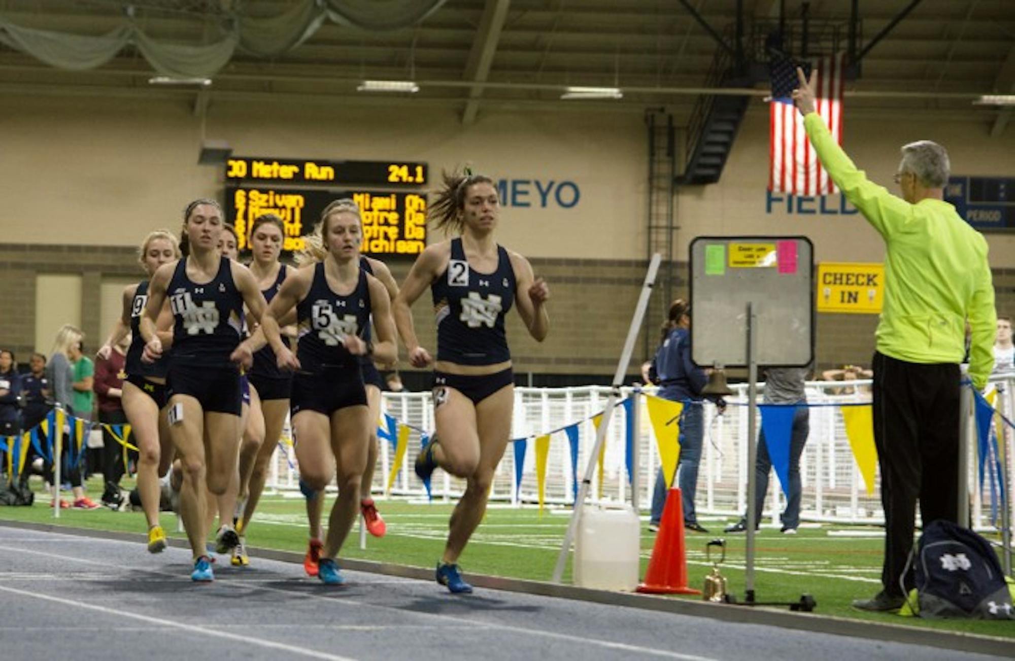 Sophomore Jessica Harris maintains the lead in the distance medley relay at the Alex Wilson Invitational on Feb. 20.