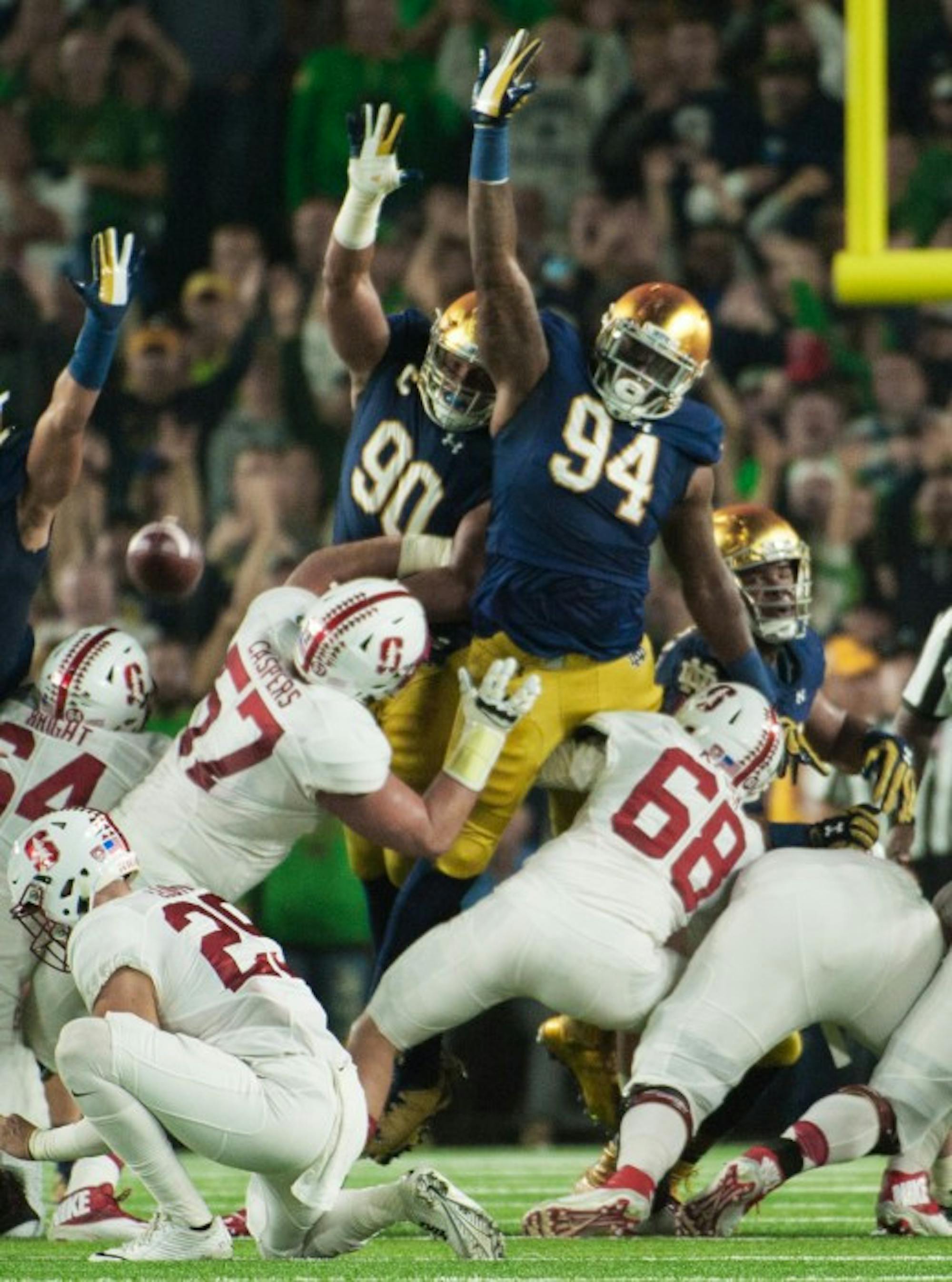 Irish graduate student defensive lineman Jarron Jones, 94, attempts to block a field goal during Notre Dame's 17-10 loss to Stanford on Oct. 15 at Notre Dame Stadium.