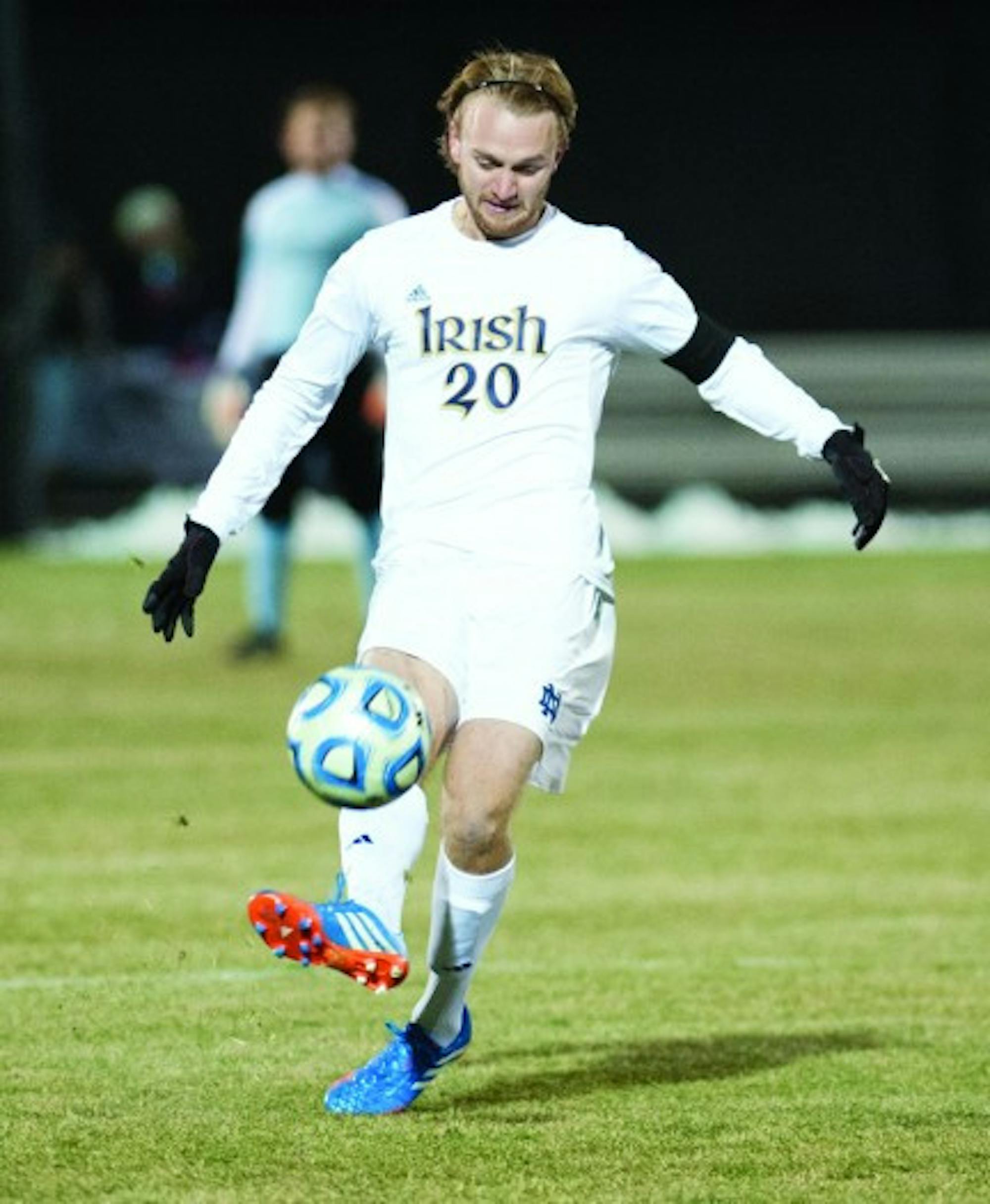 Former Irish center back Grant Van De Casteele passes in Notre Dame’s 4-0 win Nov. 24, 2013, against Wisconsin. Casteele was drafted by the Colorado Rapids in the first round of the MLS draft Thursday.