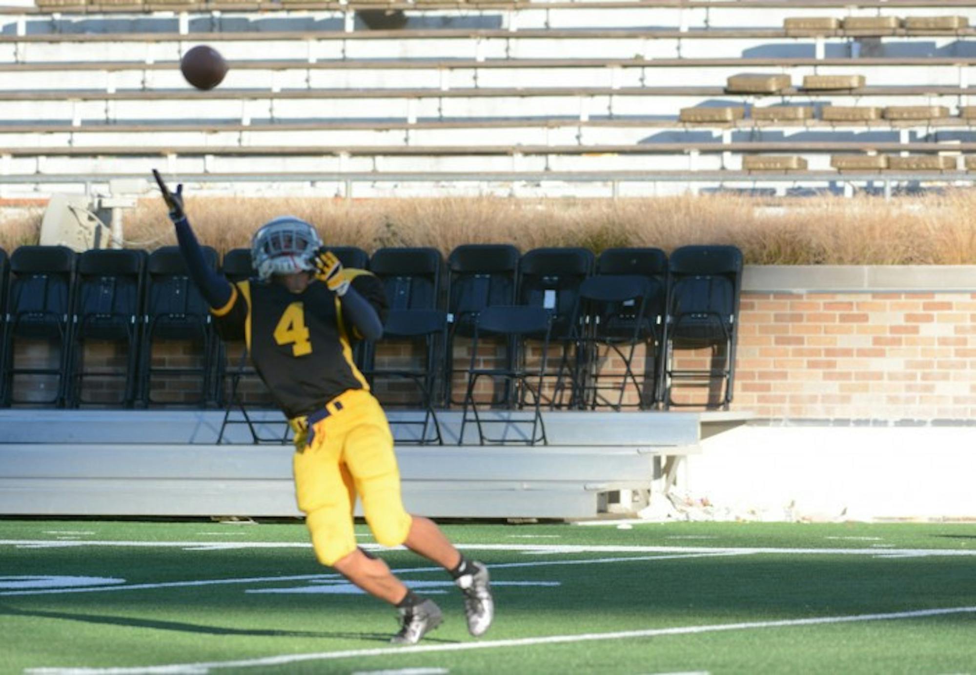 Manor freshman wide receiver and cornerback Jarod Luedecker attempts to make a catch during  Morrissey’s 12-0 win over Keenan on Sunday. Luedecker scored both touchdowns in the Manor’s win.