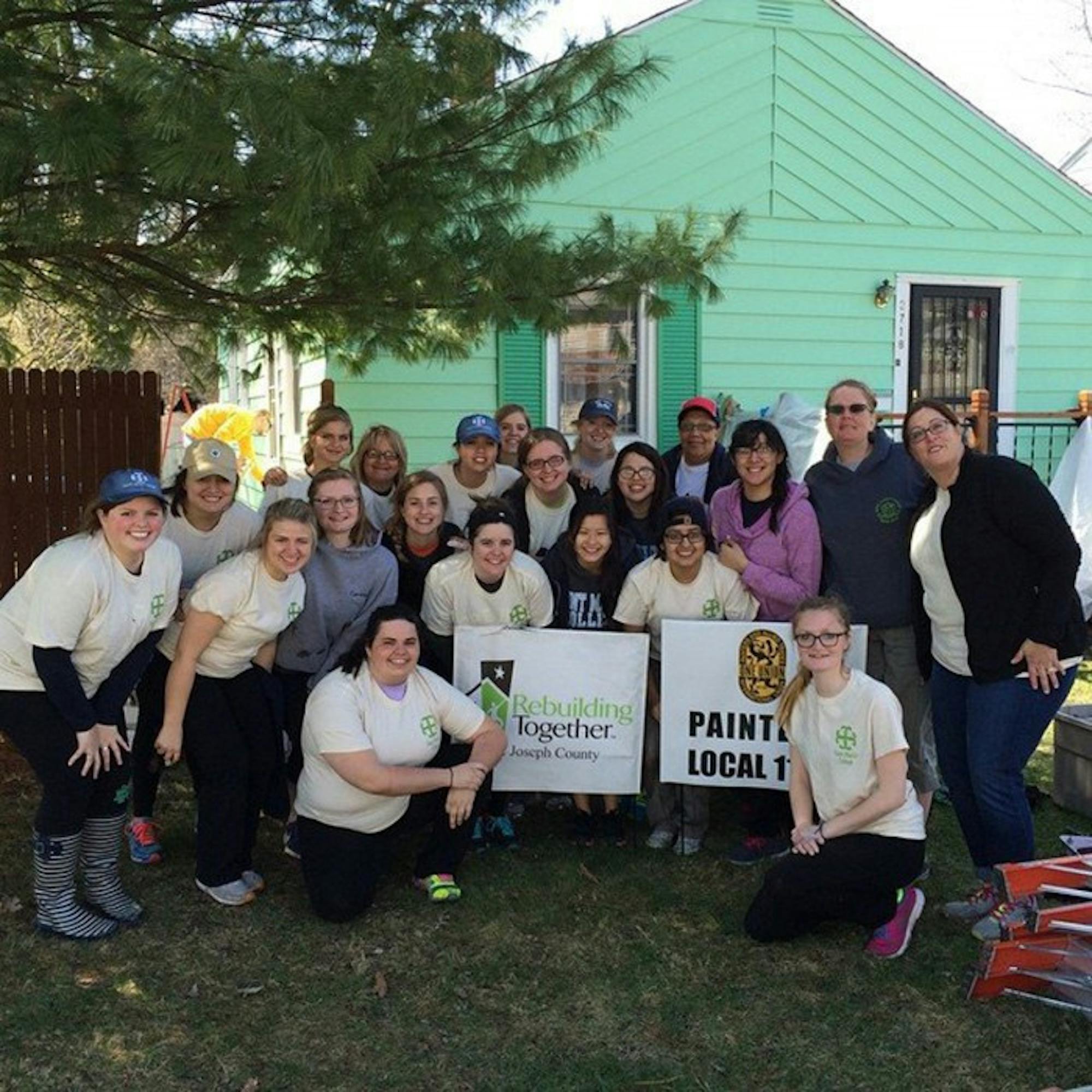 Saint Mary's students participate in Rebuilding Together, rehabing housing and working in the South Bend community.
