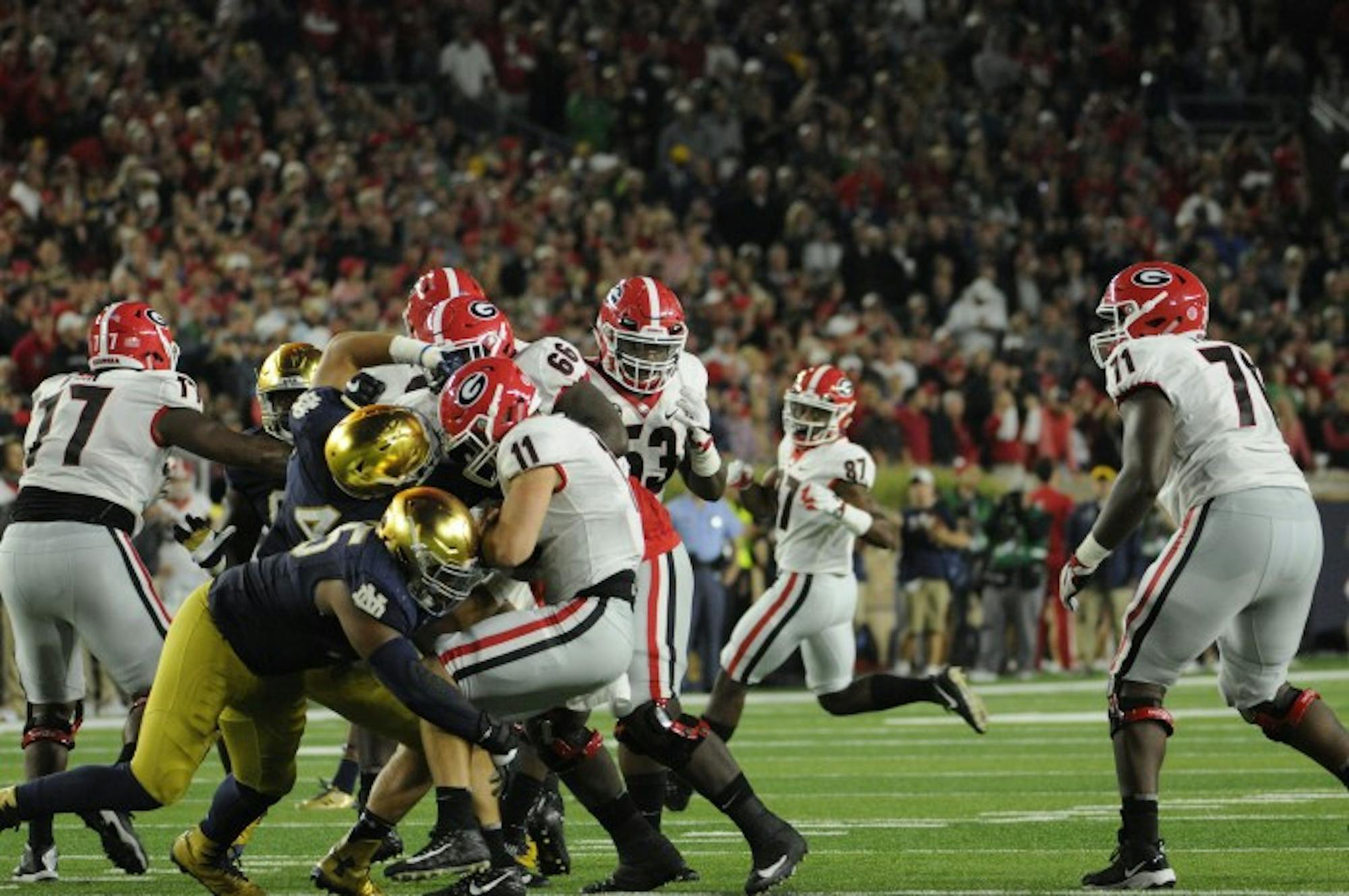 Irish senior defensive lineman Jonathan Bonner sacks freshman Bulldogs quarterback Jake Fromm in Notre Dame's 20-19 loss to Georgia on Saturday at Notre Dame Stadium.