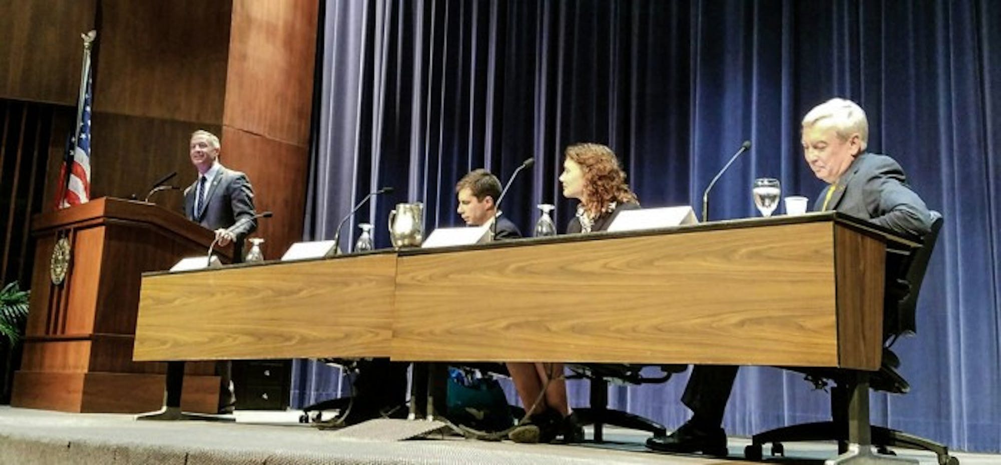 Governor Martin O'Malley, Mayor Pete Butigieg, junior Alicia Czarnecki and vice president for research Robert Bernhard sit at Thursday night's panel in McKenna Hall.