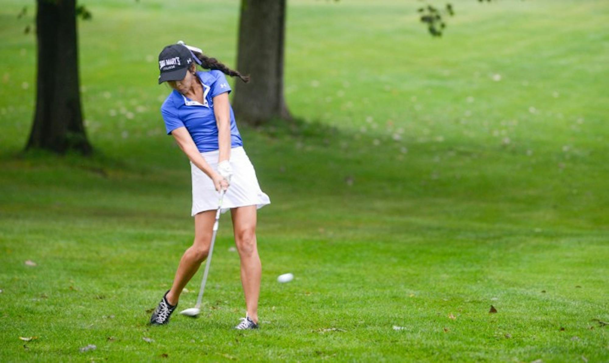 Freshman Patty Meza hits the ball during the Michiana Crosstown Clash at Elbel Golf Course in South Bend on Aug. 29.