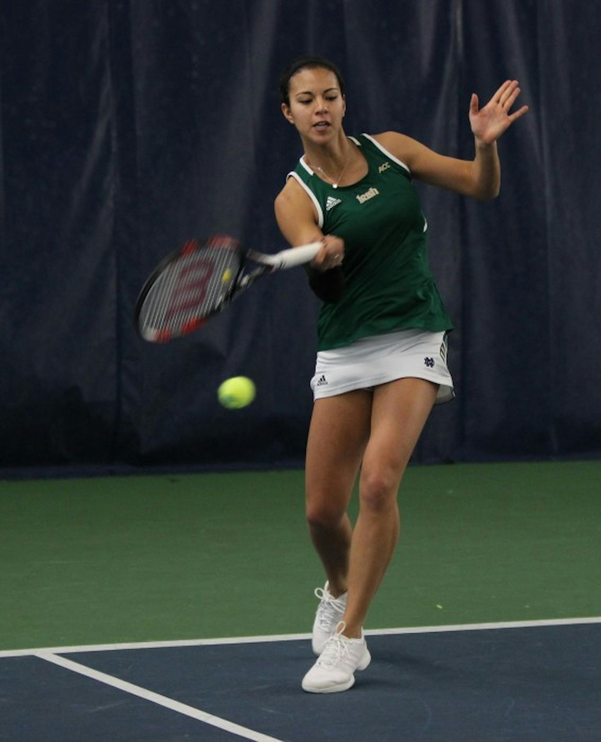 Senior Britney Sanders hits a wide forehand in her doubles match against Georgia Tech on Feb. 21. Sanders and doubles partner sophomore Quinn Gleason fell 3-6, 6-3, 7-5 to their opponents.