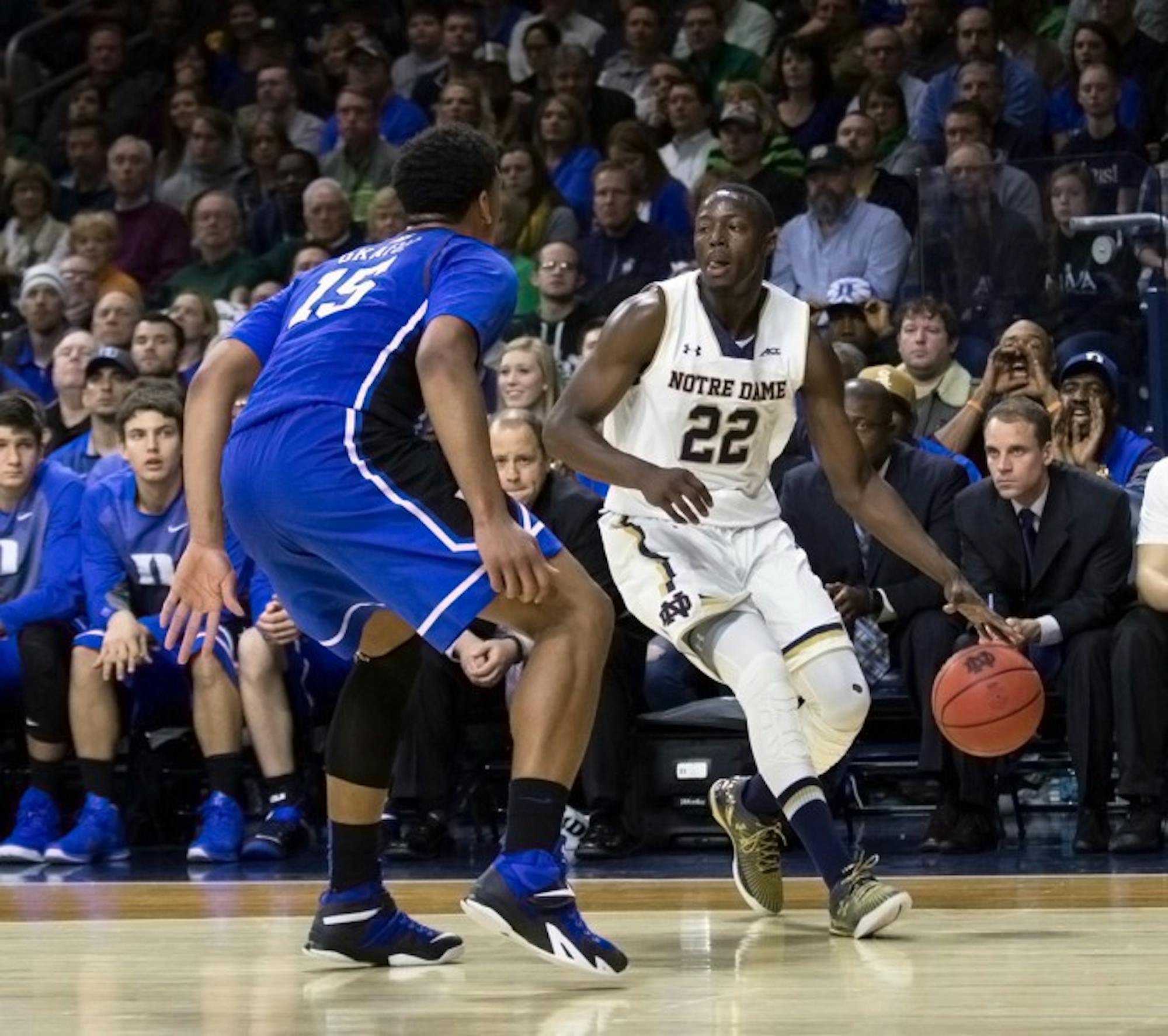Irish senior guard Jerian Grant is guarded by Duke freshman center Jahlil Okafor during Notre Dame's 77-73 win at Purcell Pavilion on Wednesday. Both players recorded double-doubles.