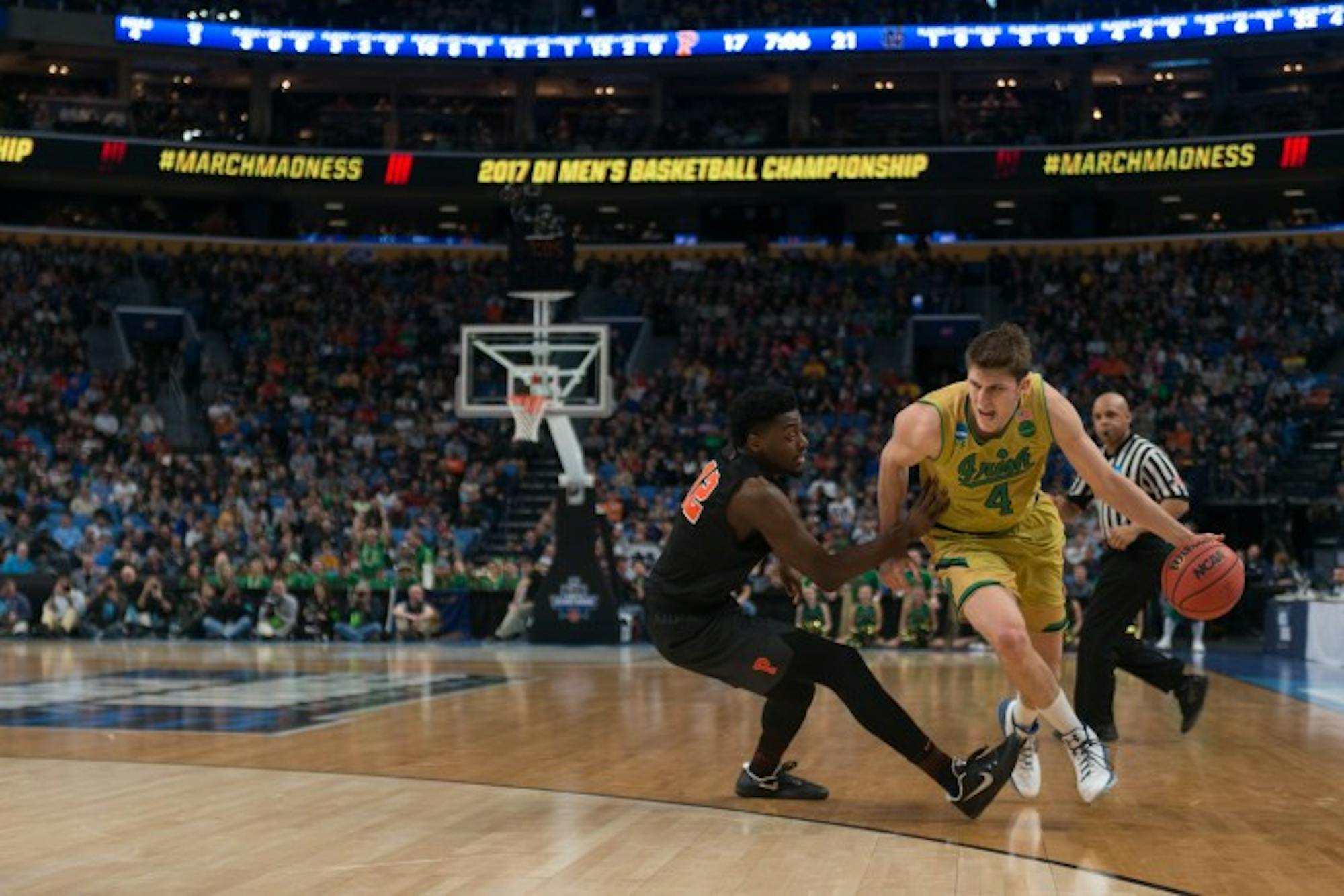 Irish sophomore forward Matt Ryan attempts to get around a defender during Notre Dame's 60-58 victory over Princeton on Thursday at KeyBank Arena.