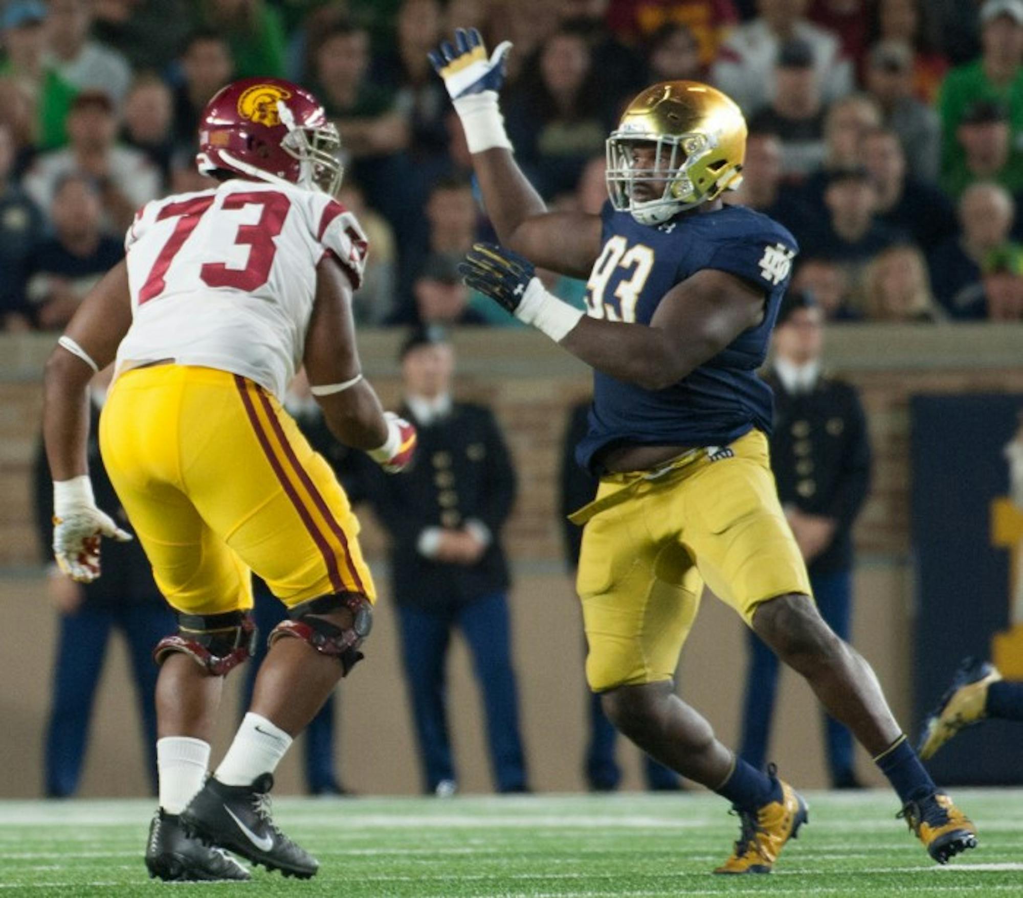 Irish senior defensive lineman Jay Hayes rushes past a USC defender during Notre Dame's 49-14 win over the Trojans on Sat. at Notre Dame Stadium.