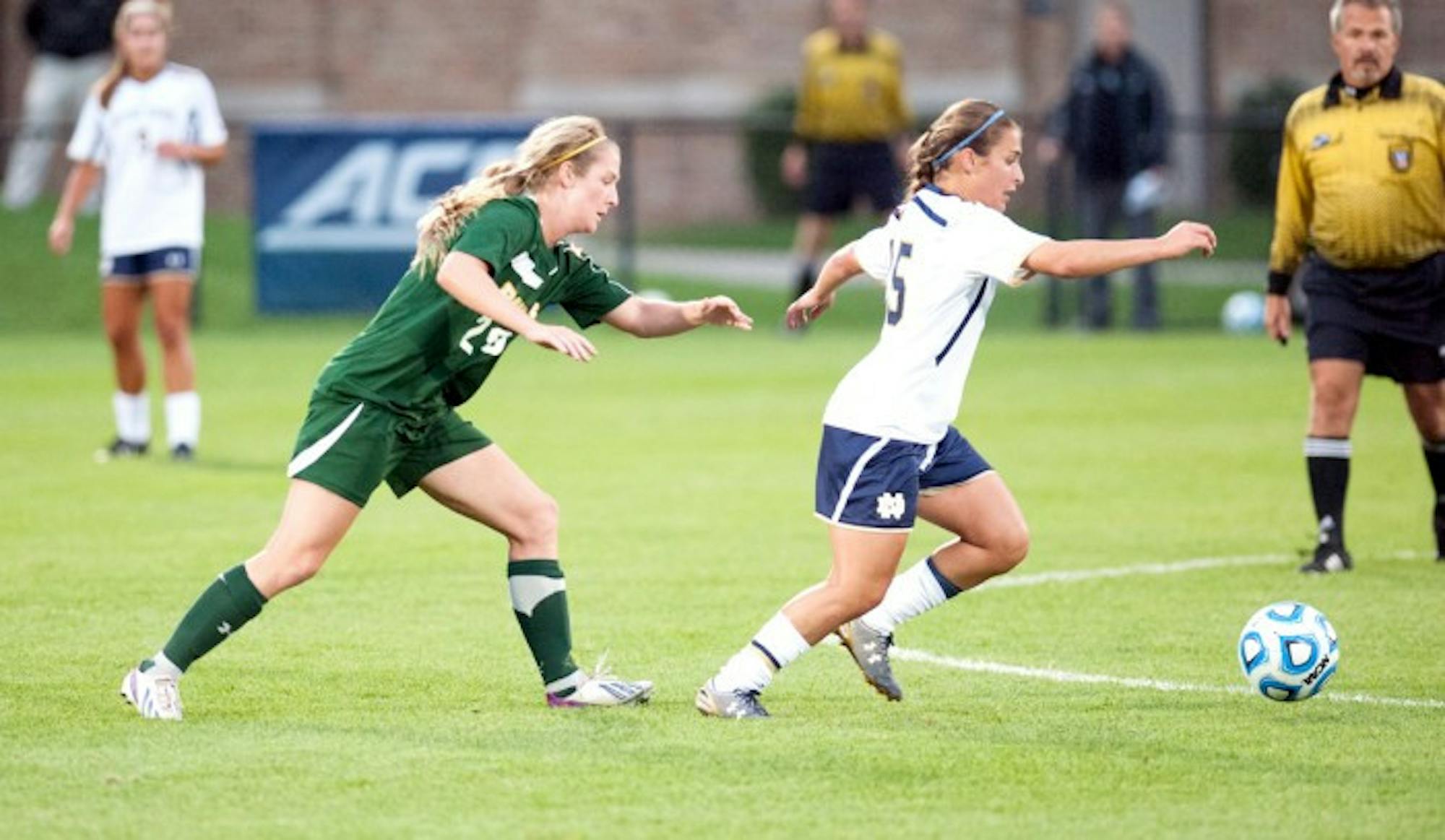 Irish freshman defender Sabrina Flores keeps an attacker away from the ball during Notre Dame's 1-0 victory over Baylor on Sept. 12 at Alumni Stadium.