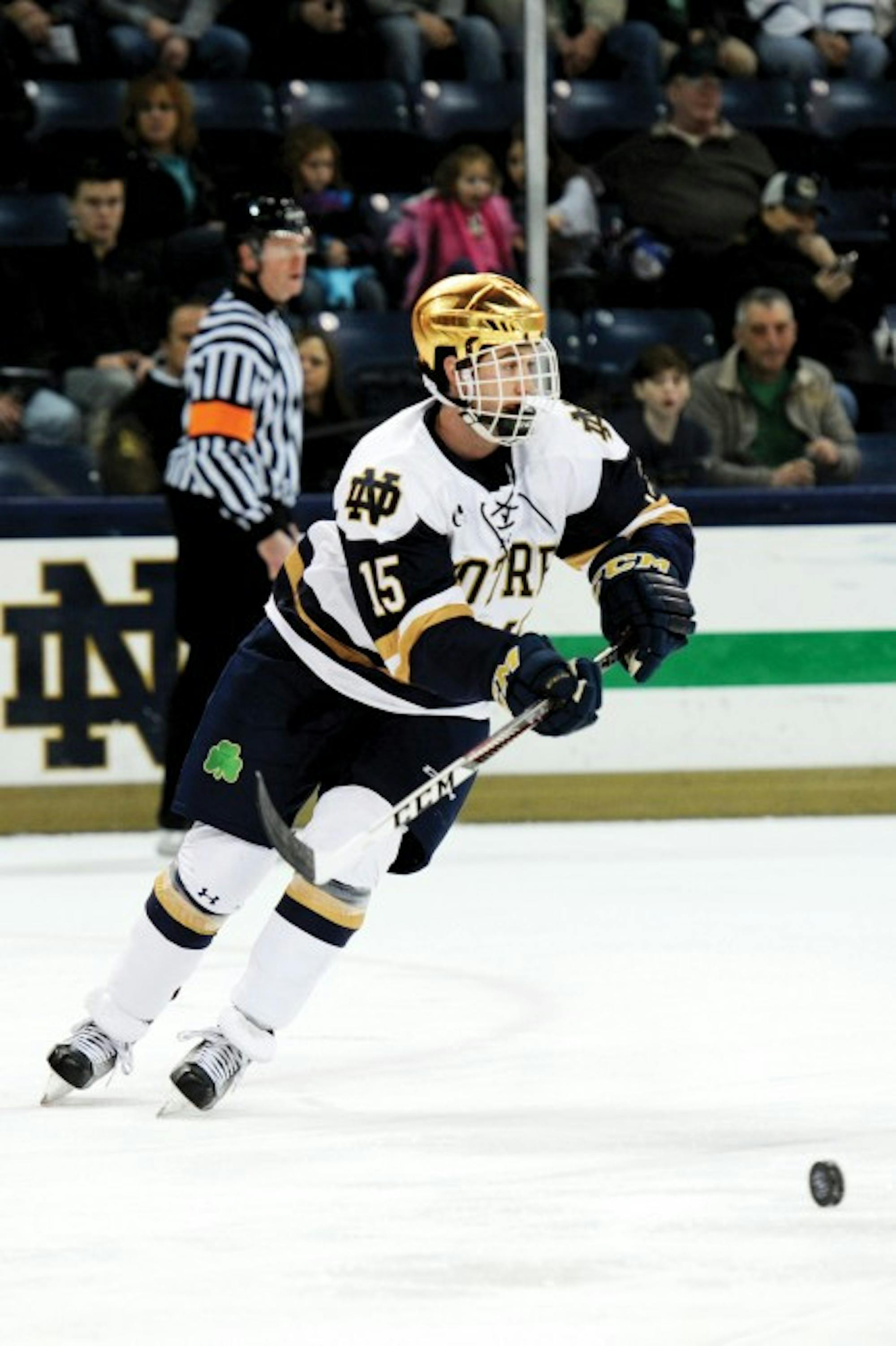 Irish sophomore Andrew Oglevie forward takes control of the puck during Notre Dame’s 3-3 tie with New Hampshire on Jan. 20.