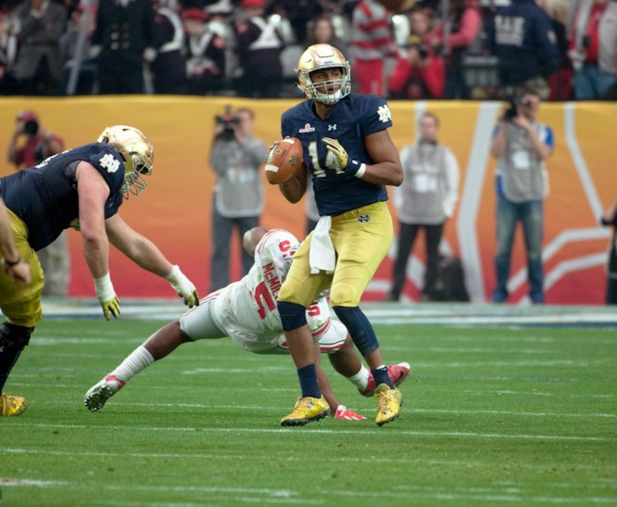 Junior quarterback DeShone Kizer surveys his options during Notre Dame’s Fiesta Bowl loss to Ohio State on Jan. 1.