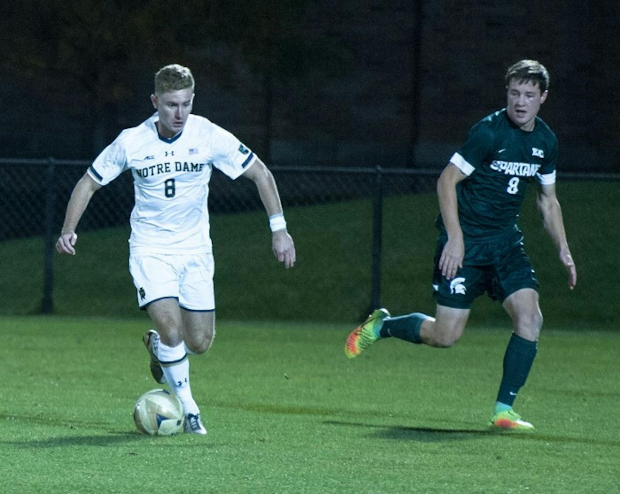 Irish junior forward Jon Gallagher dribbles the ball in Notre Dame’s 1-0 loss to Michigan State on Tuesday at Alumni Stadium.