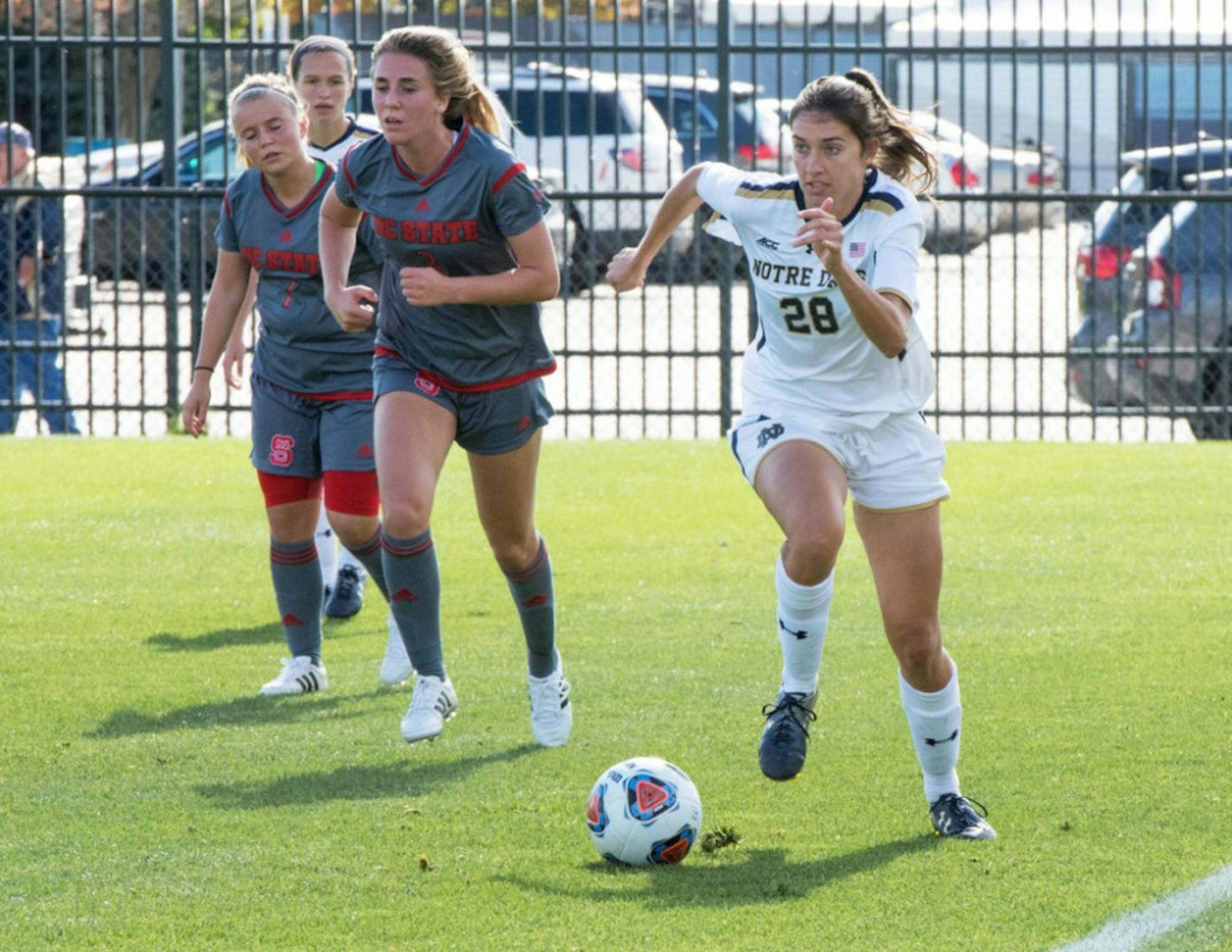 Irish junior forward Kaitlin Klawunder races down the sideline with the ball during Notre Dame’s 1-0 win over NC State on Sunday at Alumni Stadium. Klawunder sealed the win for the Irish by scoring the game’s only goal.