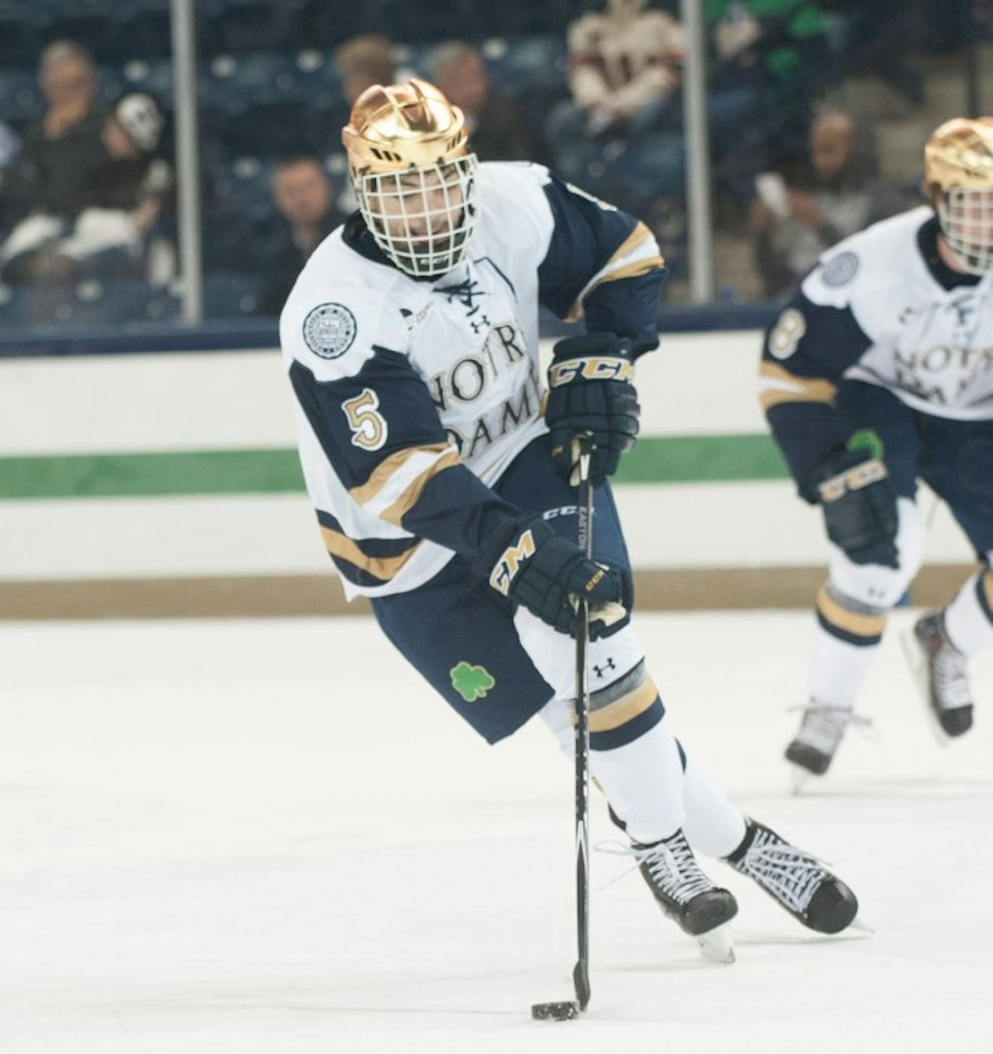 Irish senior defenseman Robbie Russo handles the puck while moving up ice Oct. 10 against Rensselaer at Compton Family Ice Arena. Rensselaer won 3-2.