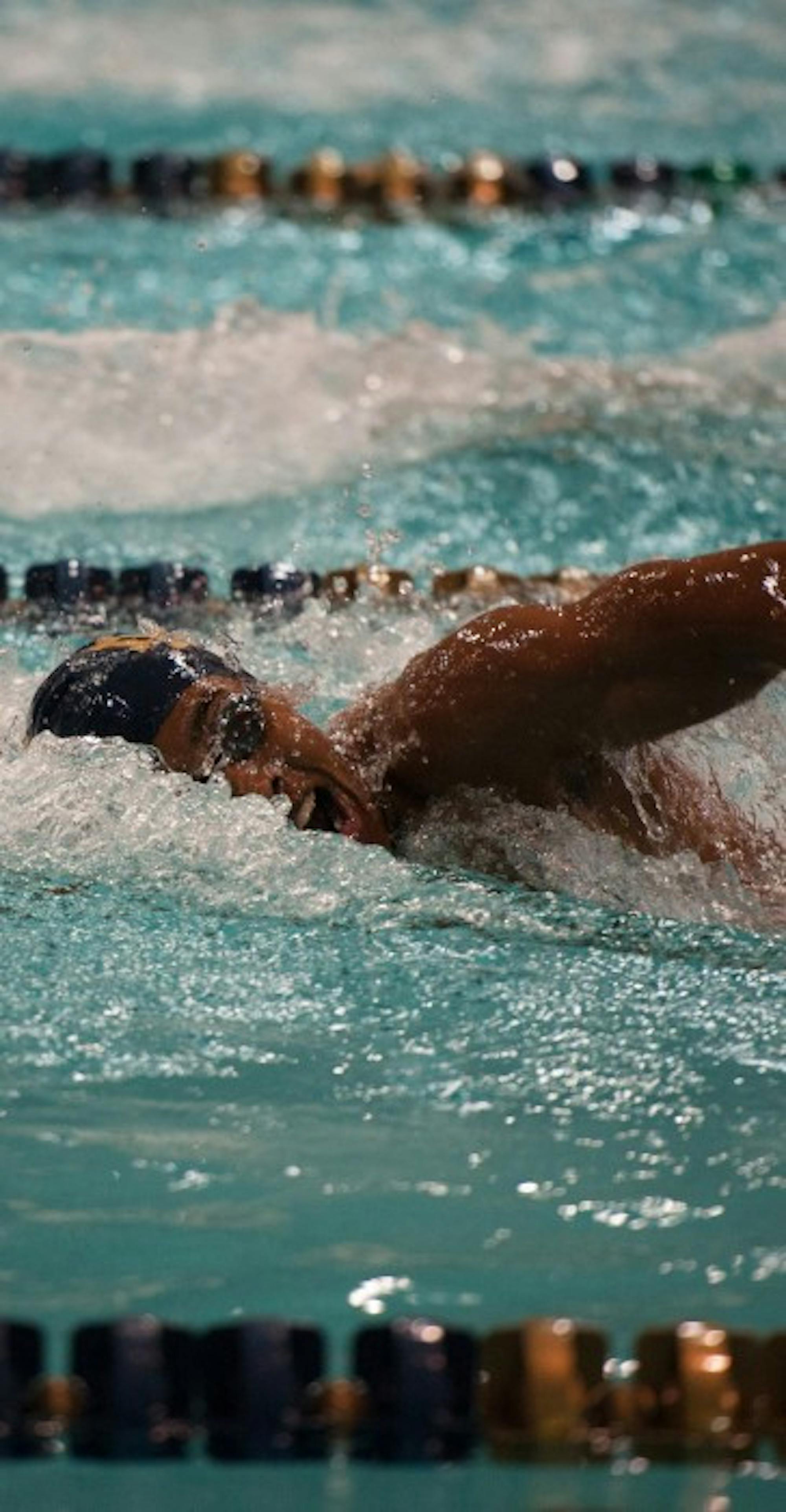 Irish sophomore Tabahn Afrik swims the 100-meter freestyle on Oct. 28 at Rolfs Aquatic Center. Afrik placed first in the race.