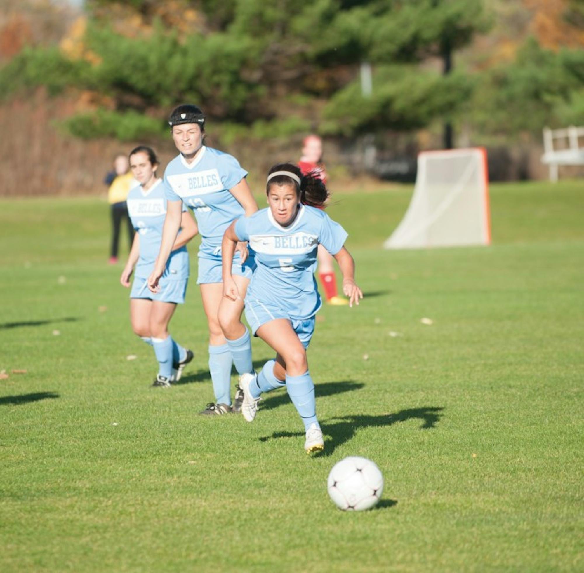 Belles freshman midfielder Baylee Adams pursues the ball during Saint Mary’s 2-0 loss to Olivet on Tuesday.