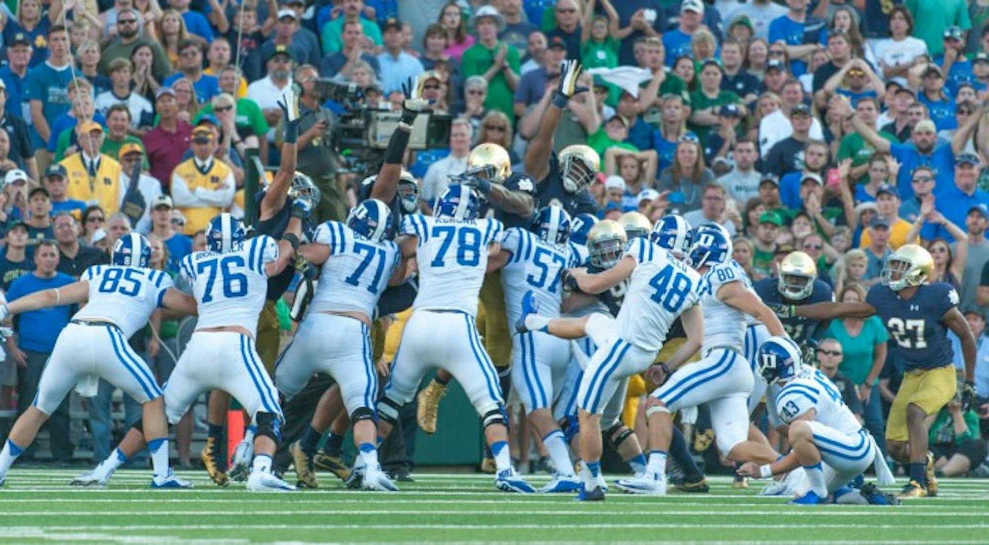 Blue Devil freshman kicker AJ Reed sends the game-winning field goal through the uprights during Duke’s 38-35 win over Notre Dame on Saturday at Notre Dame Stadium. It was Reed’s only field goal of the game.