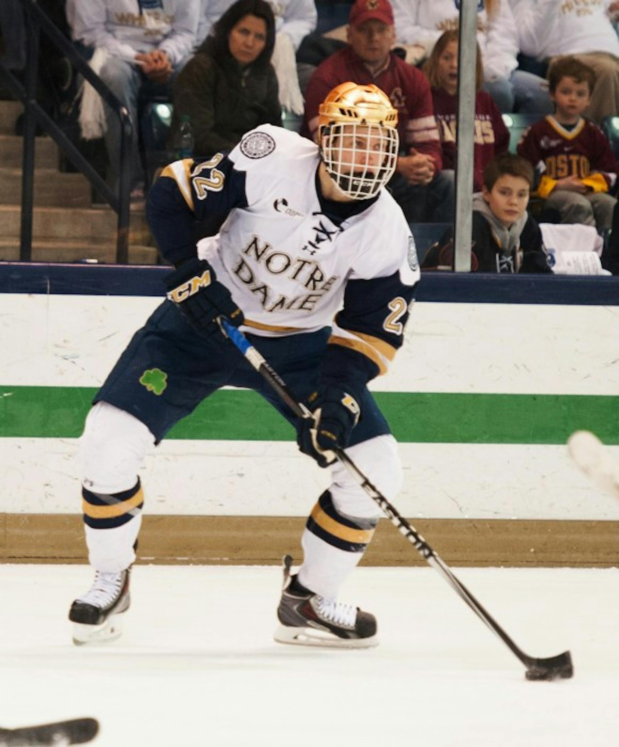 Senior left wing Mario Lucia looks to pass during a 2-0 loss to Boston College on Feb. 27 at Compton  Family Ice Arena. The Irish host Northwestern for a pair of games Thursday and Friday this week.