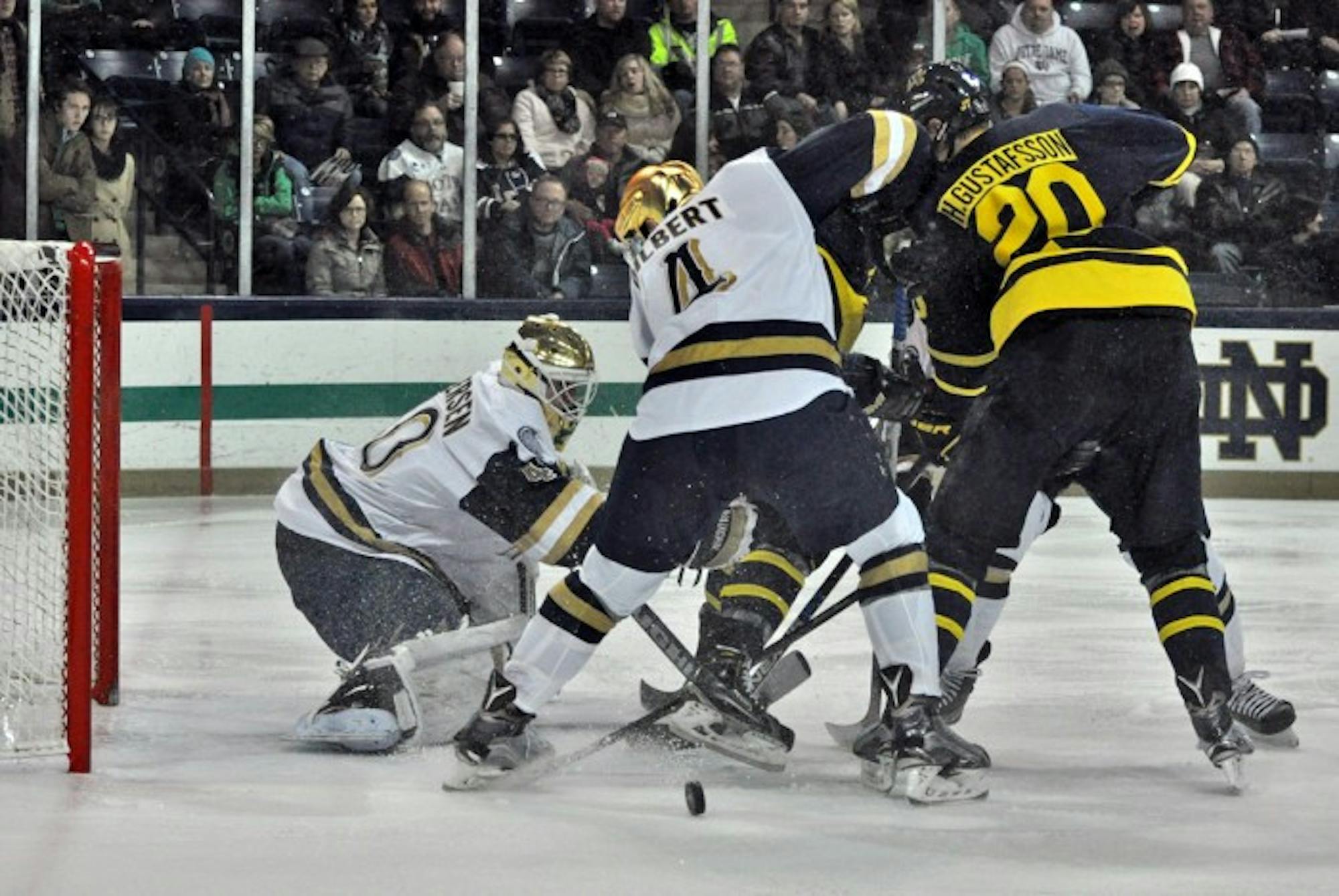 Irish sophomore goaltender Cal Petersen attempts to keep the puck out of his net during a 7-2 victory over Merrimack on Jan. 15. Petersen was recently named Hockey East goalie of the month for January.
