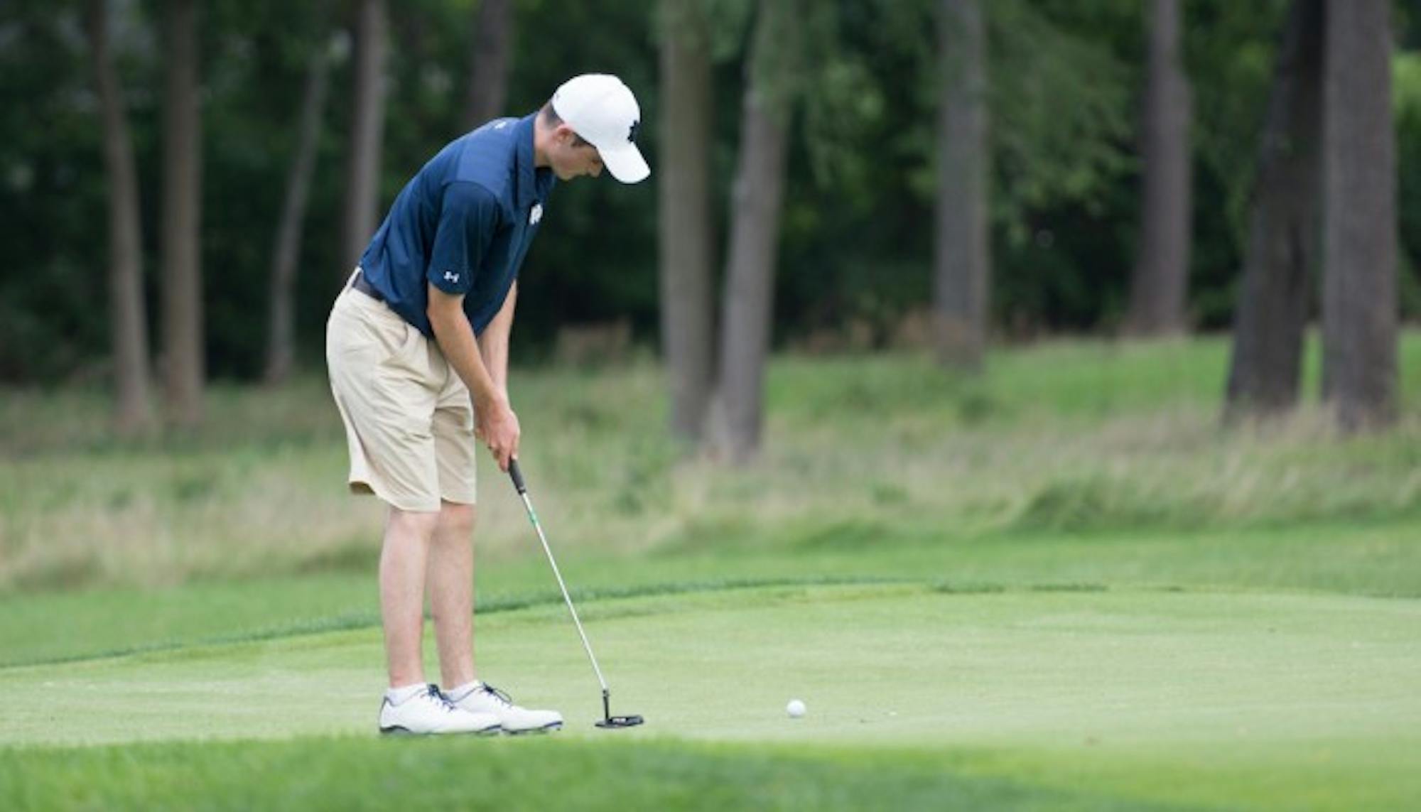 Junior Liam Cox rolls a putt on his way to a 16th place finish at the Notre Dame Kickoff Challenge, which took place at the Warren Golf Course on August 31, 2014. The Irish went on to win the tournament.
