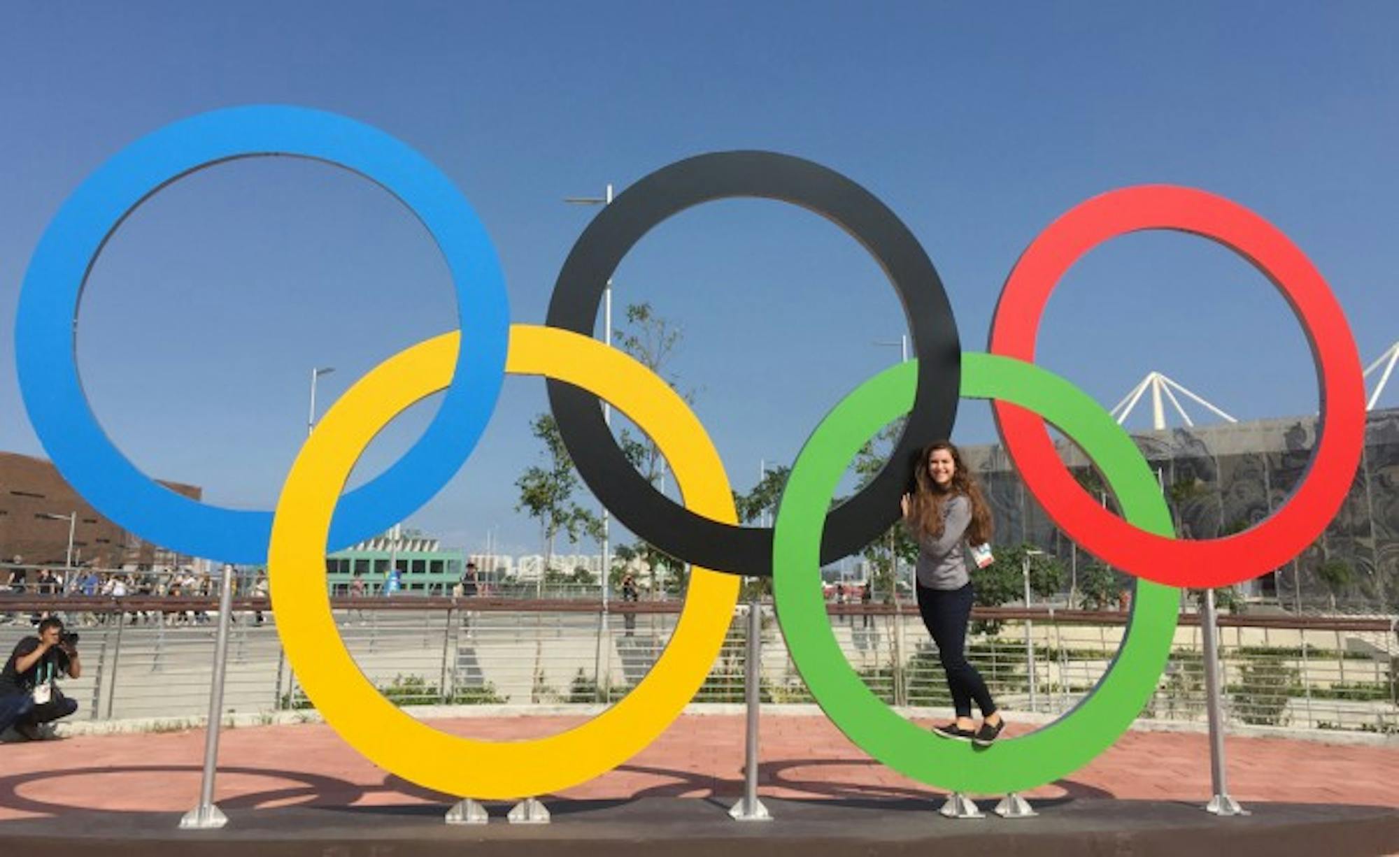 Senior Payton Erlemeier stands with the Olympic rings in Rio de Janeiro, where she was an NBC News intern for the Games over the summer after working for the network at Notre Dame football games.