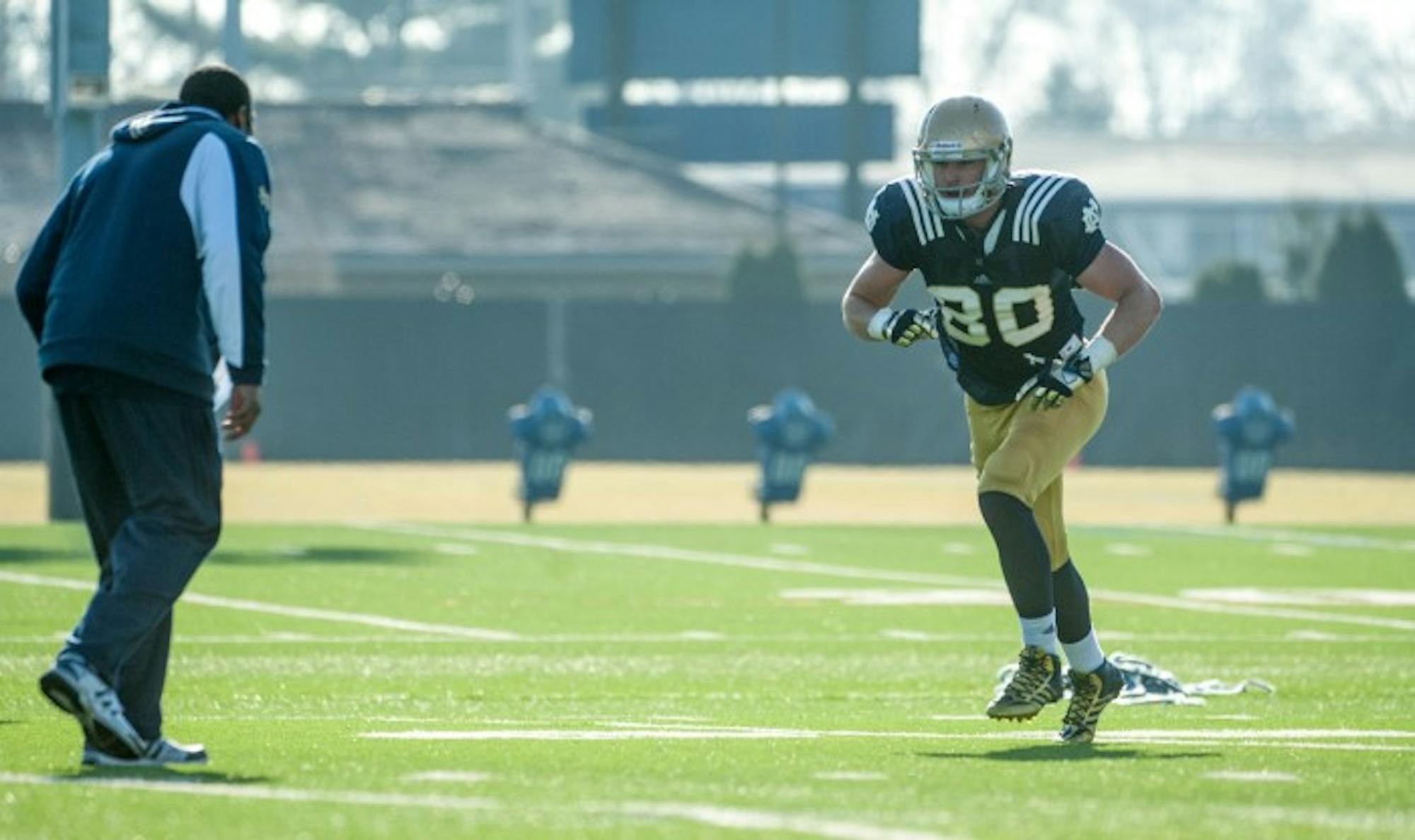 Irish junior tight end Durham Smythe runs a route April 8 at LaBar Practice Complex. Smythe only tallied one reception for seven yards in 2014 but is eyeing the starting tight end spot for the 2015 season.