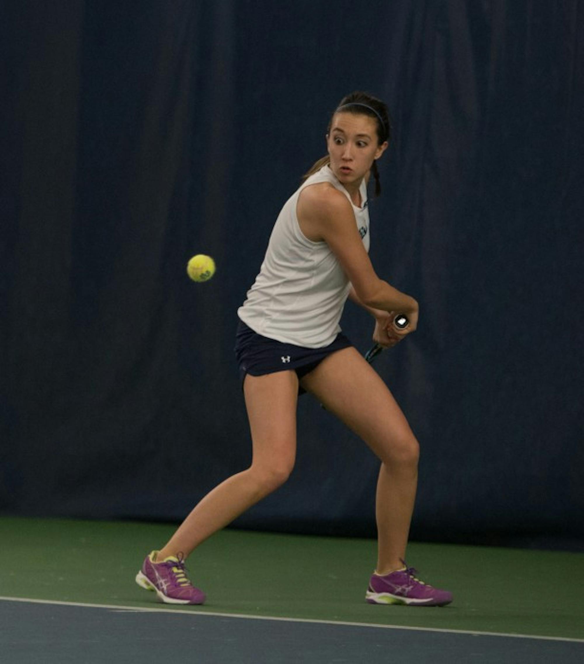 Irish junior Julie Vrable prepares a back-hand stroke in a 6-1 loss to Stanford on Feb. 6 at the Eck Tennis Pavilion.