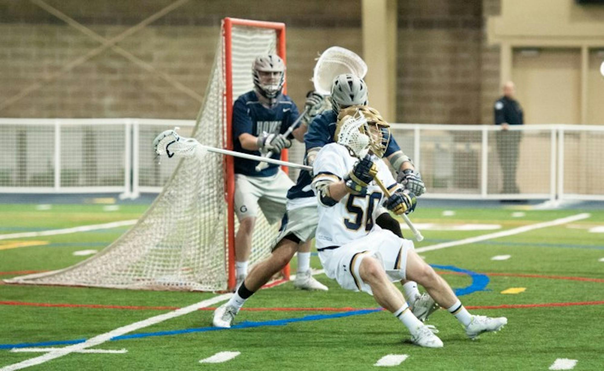 Irish sophomore attack Matt Kavanagh cuts back against a defender during Notre Dame’s 14-12 win over Georgetown on Saturday.
