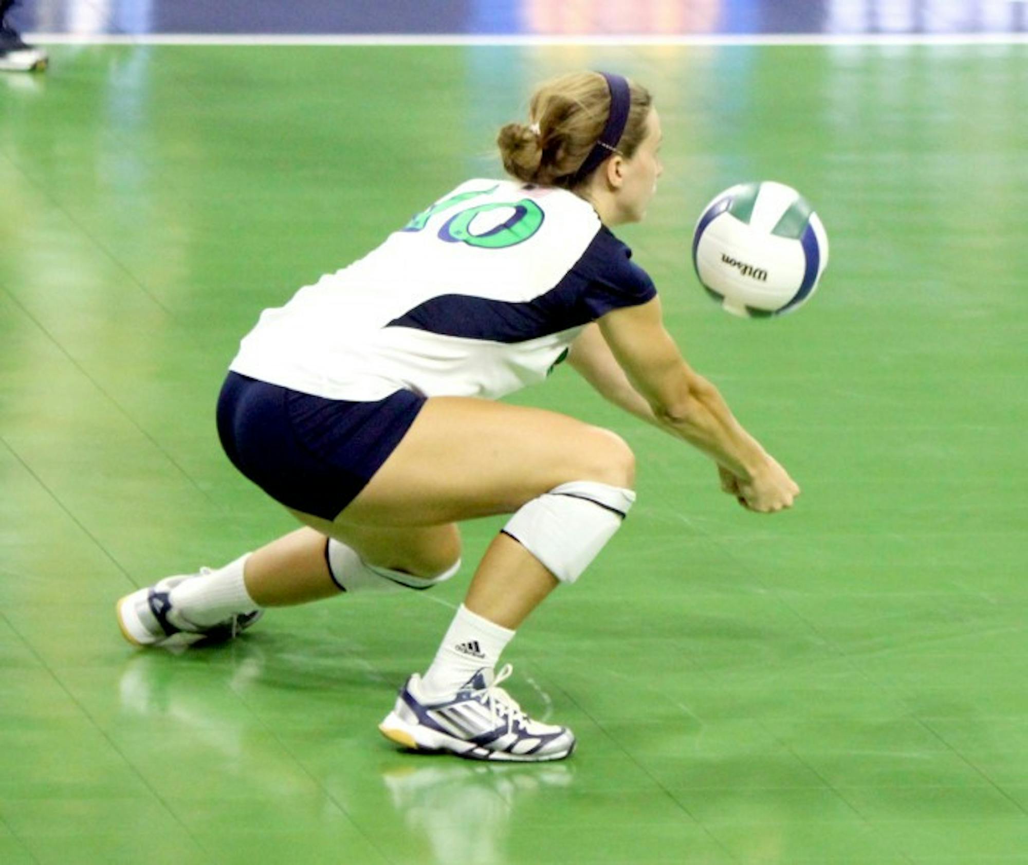 Notre Dame senior libero Kathleen Severyn digs a ball against Polish club team Dabrowa in an exhibition match on Sept. 8, 2013. Severyn and the Irish host the Shamrock Invitational this weekend at the Purcell Pavilion.