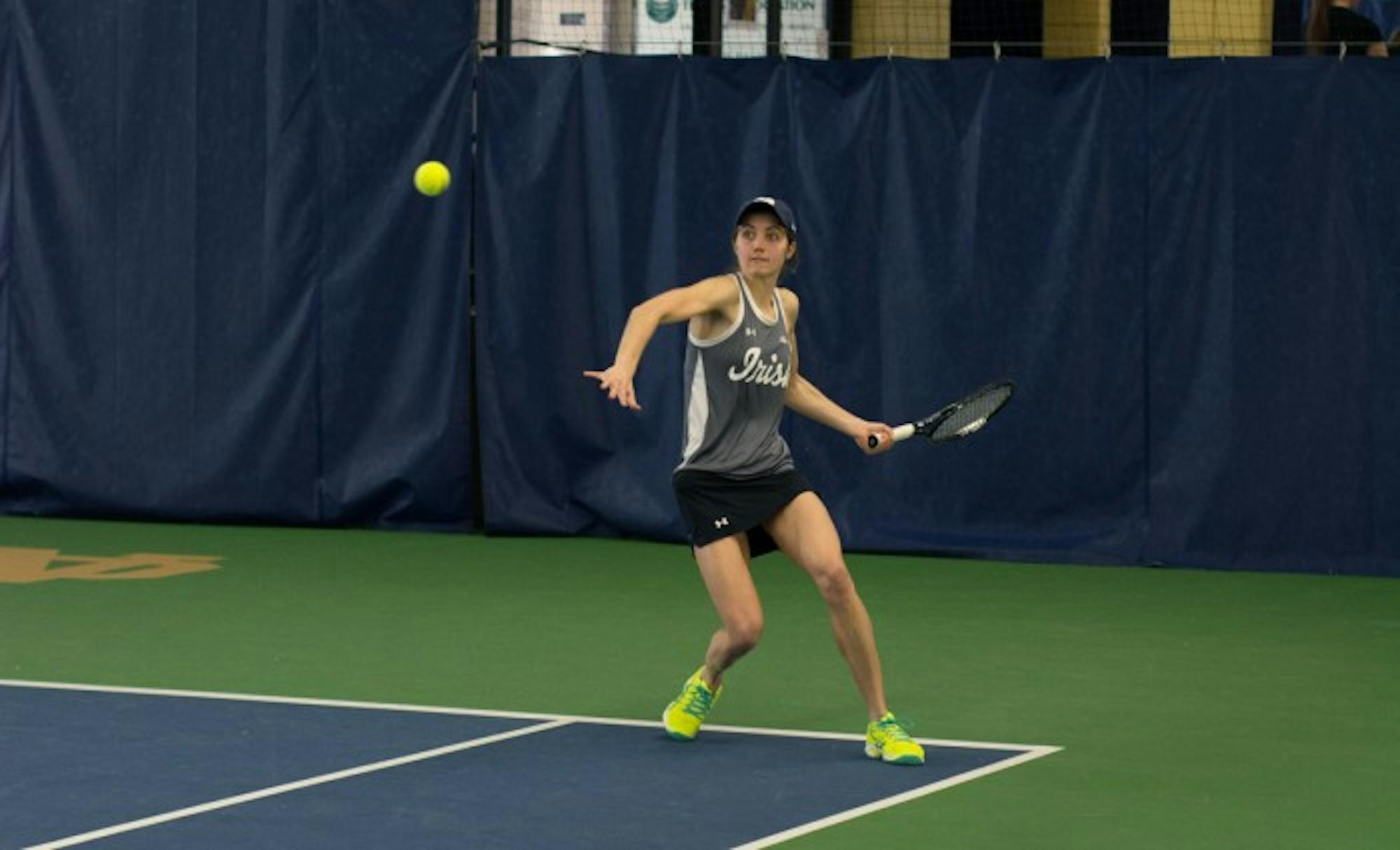 Junior Mary Closs returns a hit in her 6-1 singles victory against Indiana at Eck Tennis Pavilion on Feb. 20.