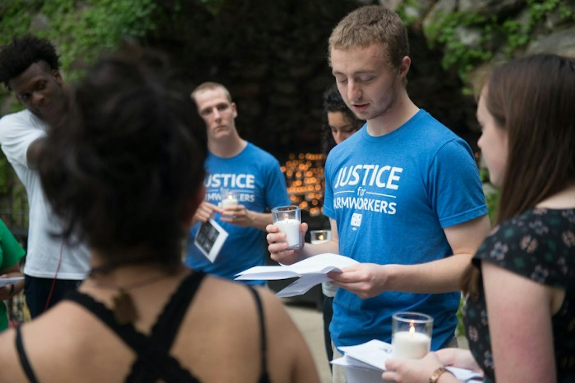Junior Tommy Clarke leads a prayer service to begin the hunger strike.
