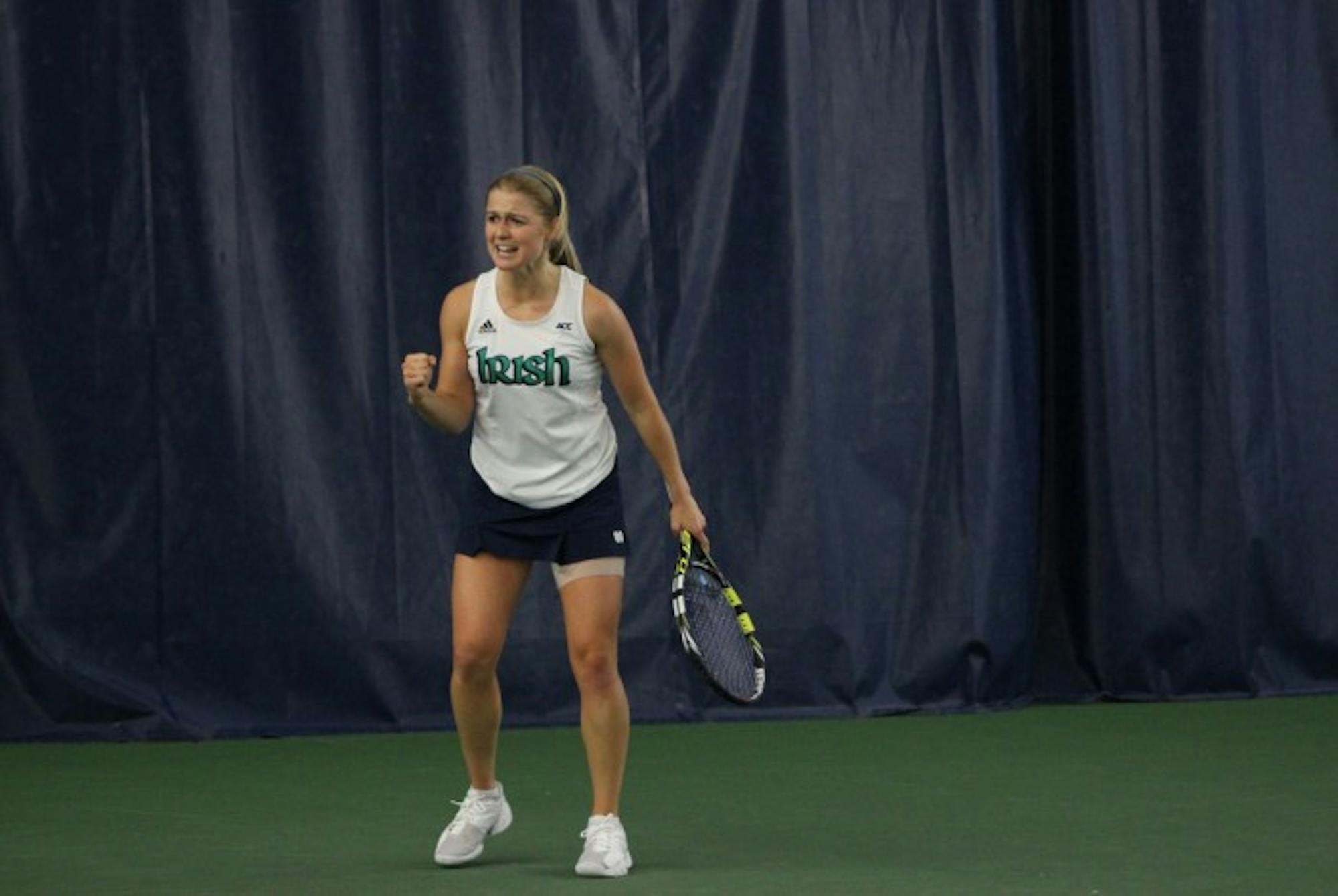 Irish sophomore Monica Robinson celebrates after winning a point in Notre Dame’s match against  Indiana on Feb. 2 at Courtney Tennis Center. Notre Dame defeated Indiana 4-3.