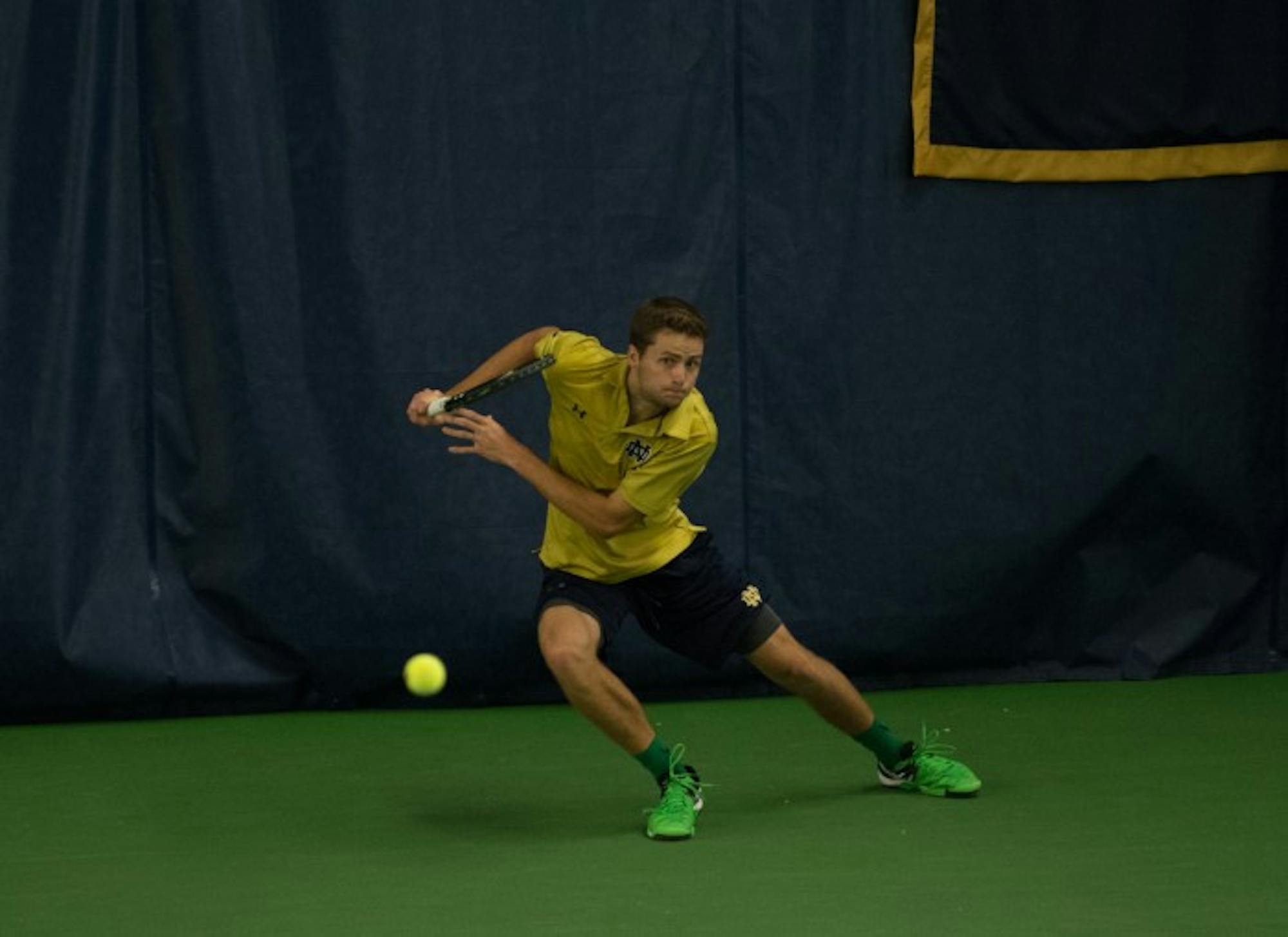 Irish senior Quentin Monaghan rushes to return a ball during Notre Dame’s 5-2 victory over Duke on March 18 at Eck Tennis Pavilion.