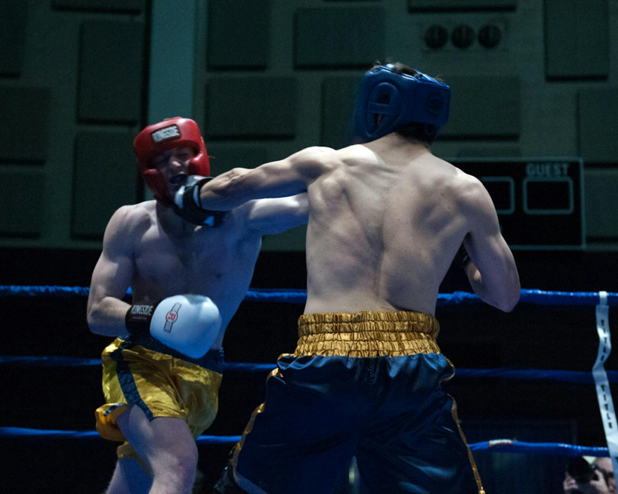 Bengal Bouts president Evan Escobedo, right, fights freshman Pat Gordon during the Bengal Bouts semifinals at Joyce Fieldhouse.