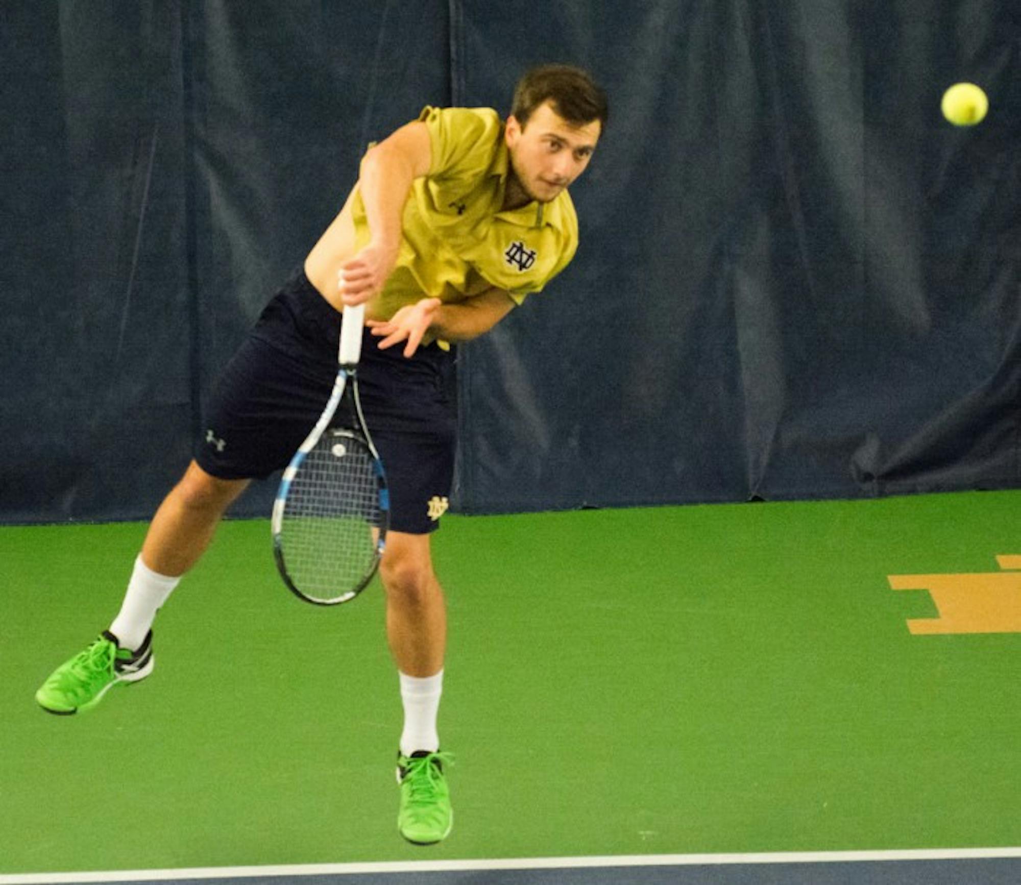 Irish senior Eddy Covalschi returns the ball during Notre Dame’s 5-2 win over Duke on March 18 at Eck Tennis Pavilion.