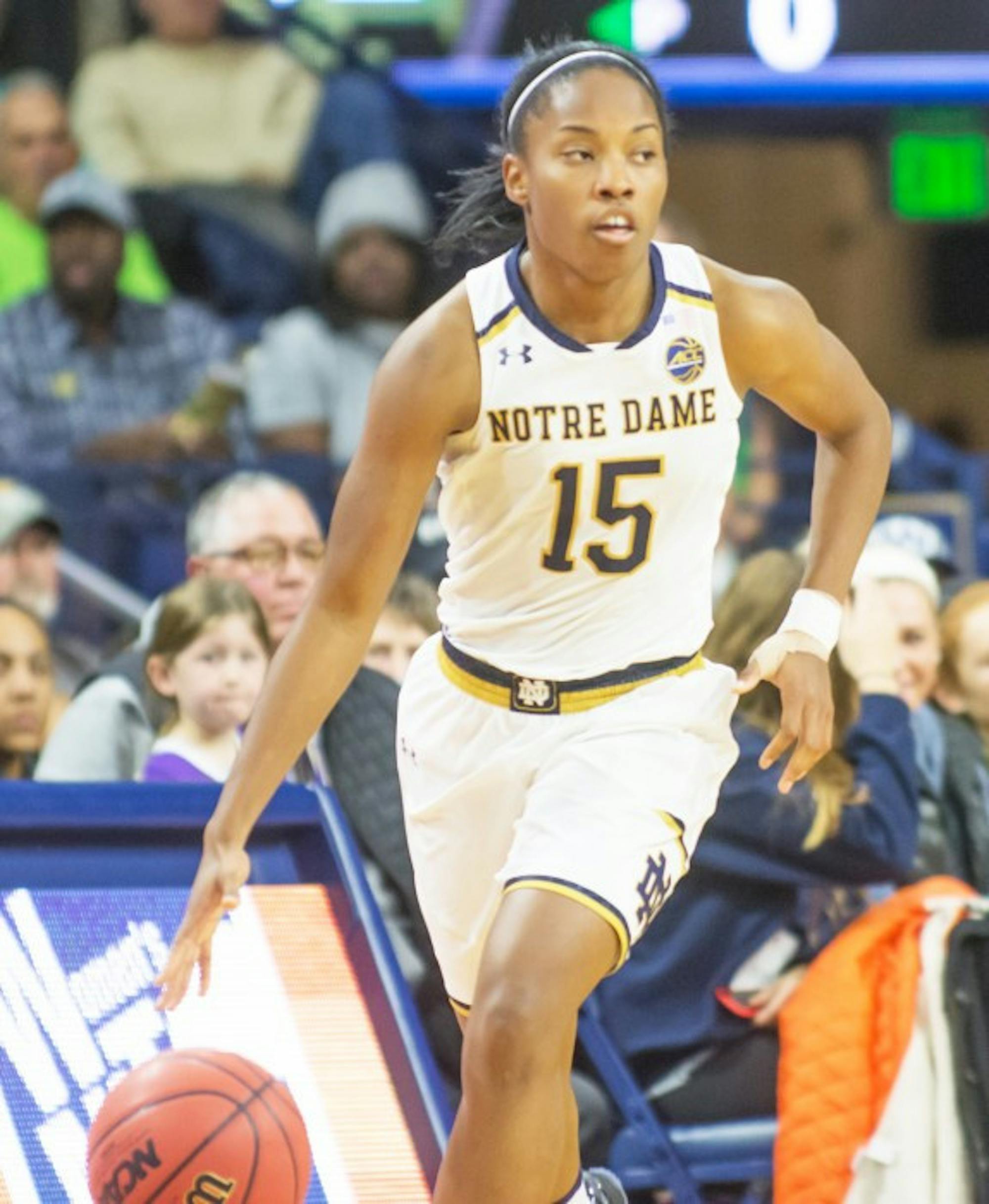 Irish senior guard Lindsay Allen dribbles up the court during the team’s 71-60 win against Washington at Purcell Pavilion on Nov. 20. Against Louisiana-Lafayette. she recorded her 1,000th career point, and she posted her 600th career assist against TCU.