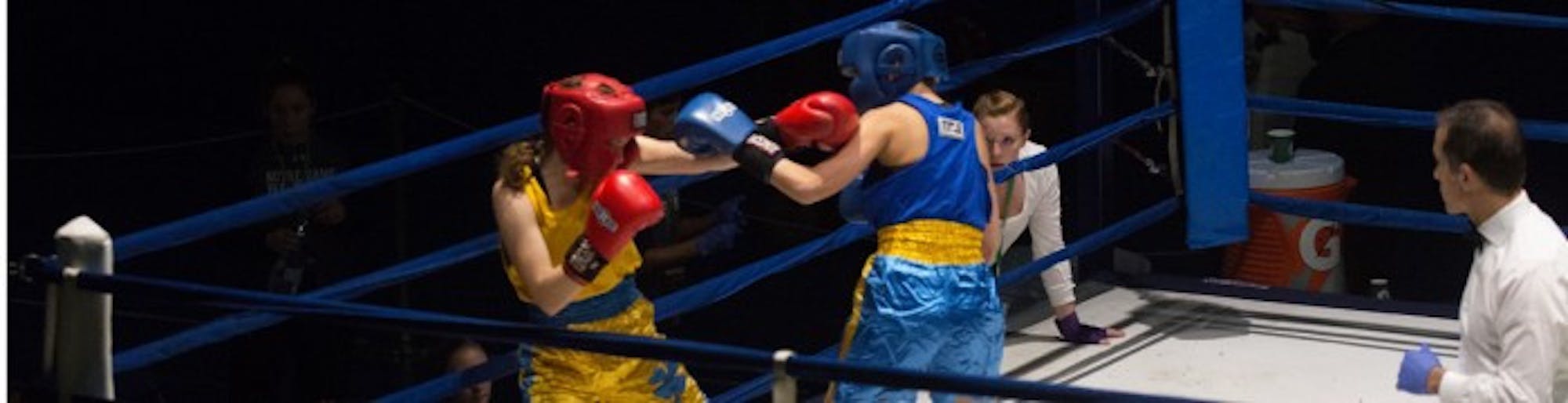 A participant in the 14th Annual Baraka Bouts successfully lands a punch on her opponent at the Joyce Athletic and Convocation Center on Thursday. Baraka Bouts raised a total of $120,000 for the Holy Cross Missions in East Africa as a result of the 2015 tournament. This marks the first year that there will be three rounds of Baraka Bouts.