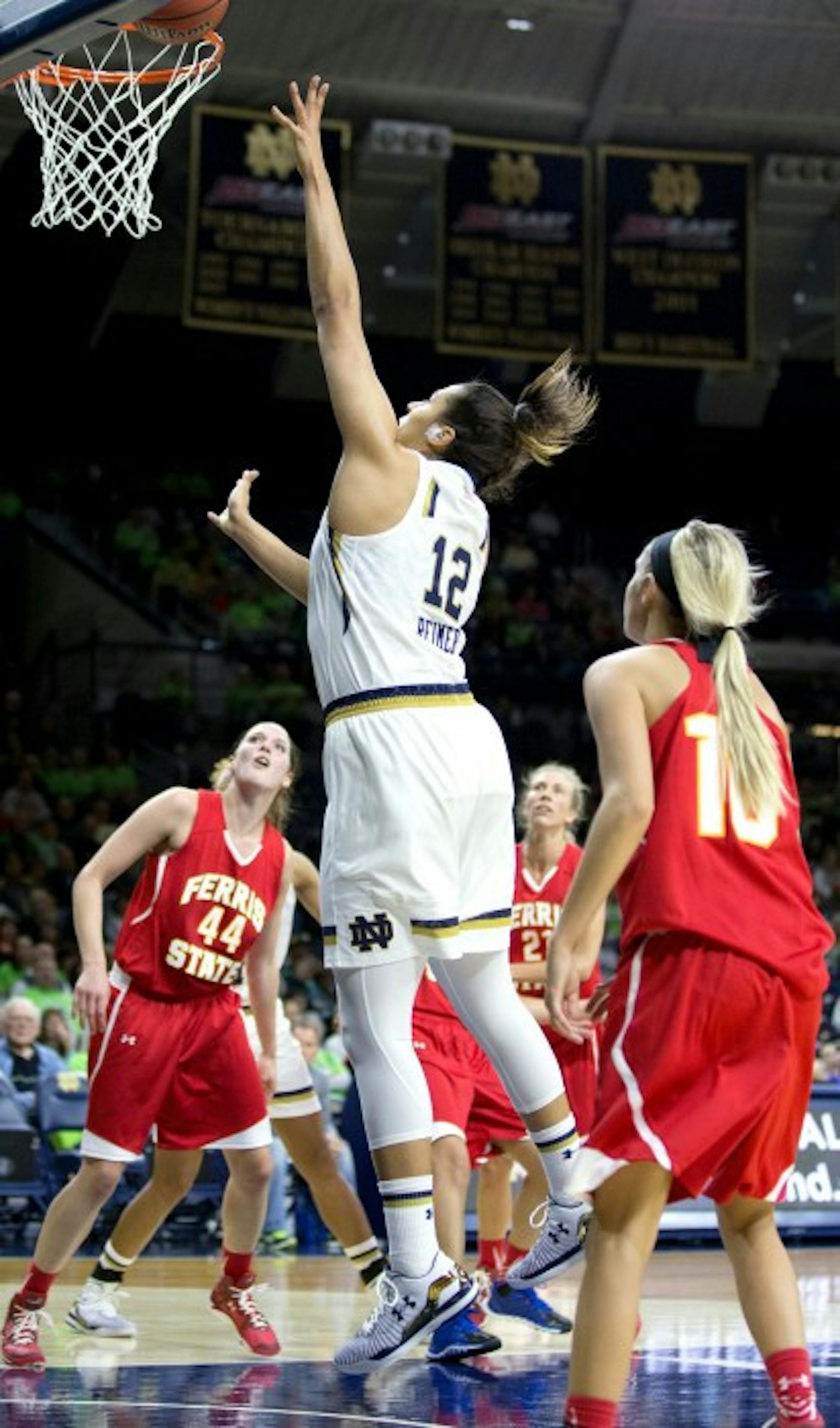 Irish sophomore forward Taya Reimer goes up for a rebound during Notre Dame’s win over Ferris State on Wednesday night.