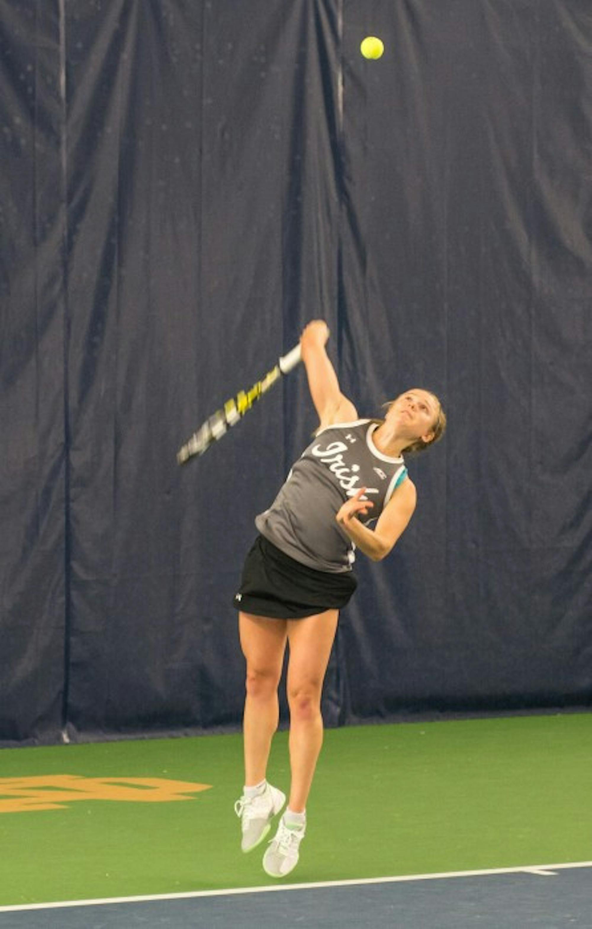 Irish junior Monica Robinson serves during Notre Dame’s 6-1 win over Indiana on Feb. 20 at Eck Tennis Pavilion.