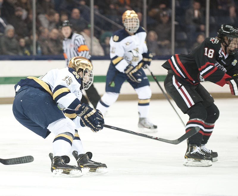20140124-Hockey-v-Northeastern-Schneider-by-Michael-Yu
