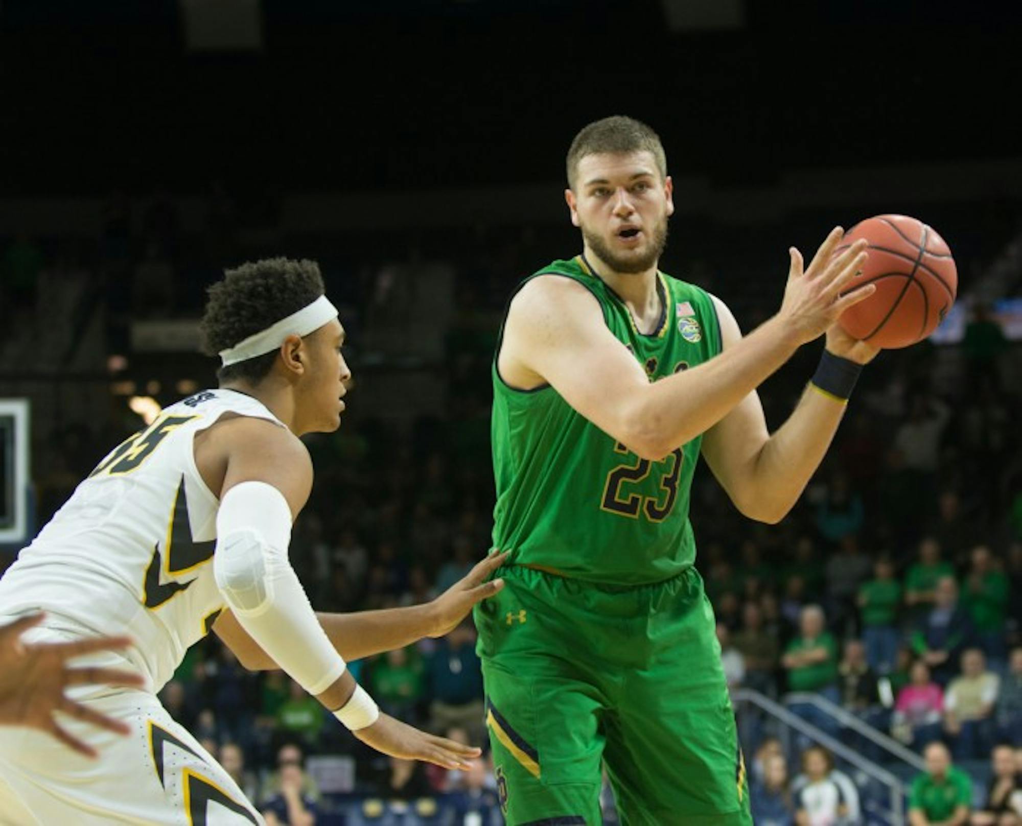 Irish junior forward Martinas Geben looks to pass during Notre Dame's 92-78 win over Iowa on Tuesday at Purcell Pavilion.