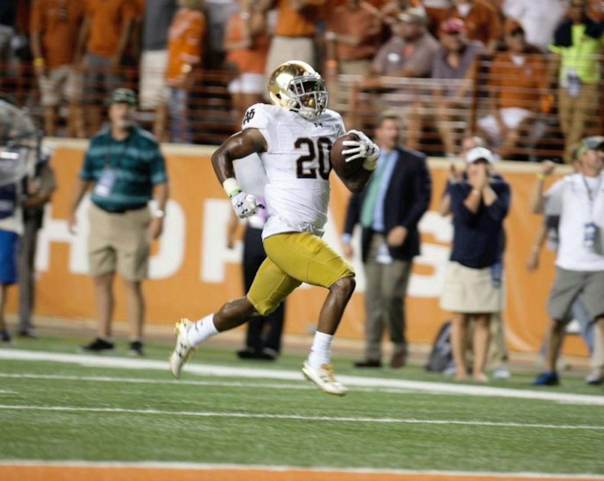 Irish sophomore cornerback Shaun Crawford returns a blocked extra-point attempt for two points in the fourth quarter of Notre Dame’s 50-47 loss against Texas on Sunday at Darrell K. Royal-Texas Memorial Stadium. Crawford’s return tied the score at 37 with 3:29 remaining in the game, pushing it into overtime.