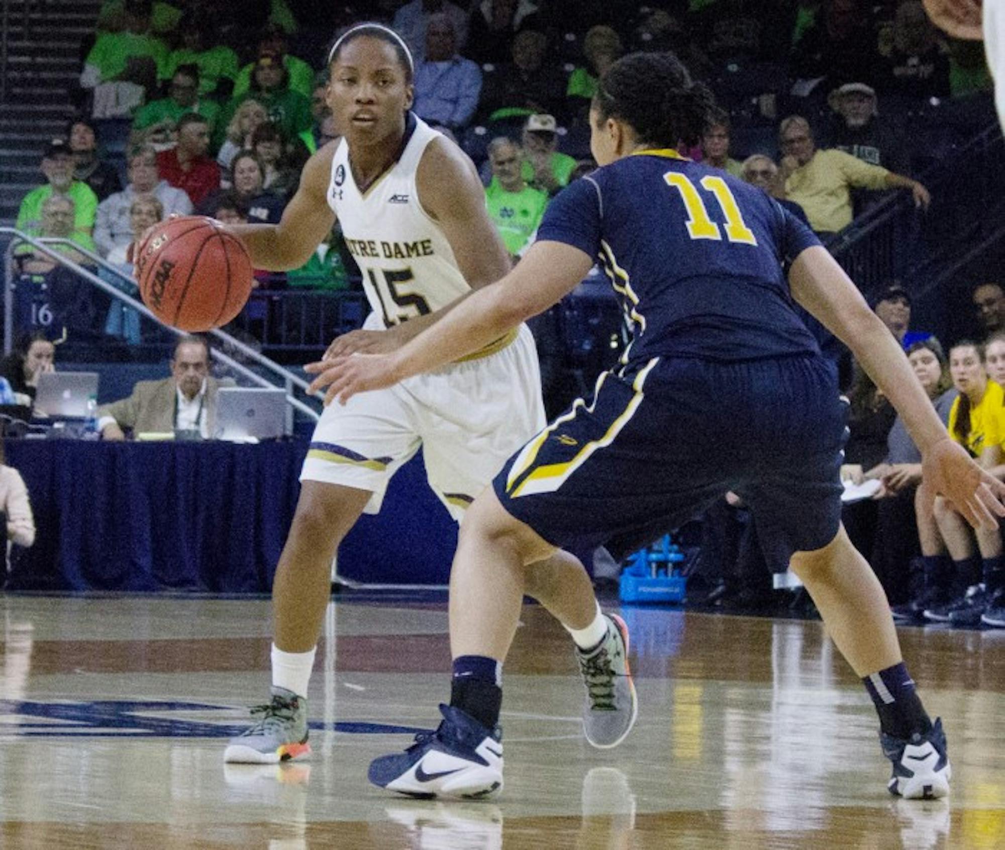 Junior guard Lindsay Allen sizes up a defender during the 74-39 Irish victory over Toledo at Purcell  Pavilion on Wednesday night. Allen had 10 points and nine assists in the win.