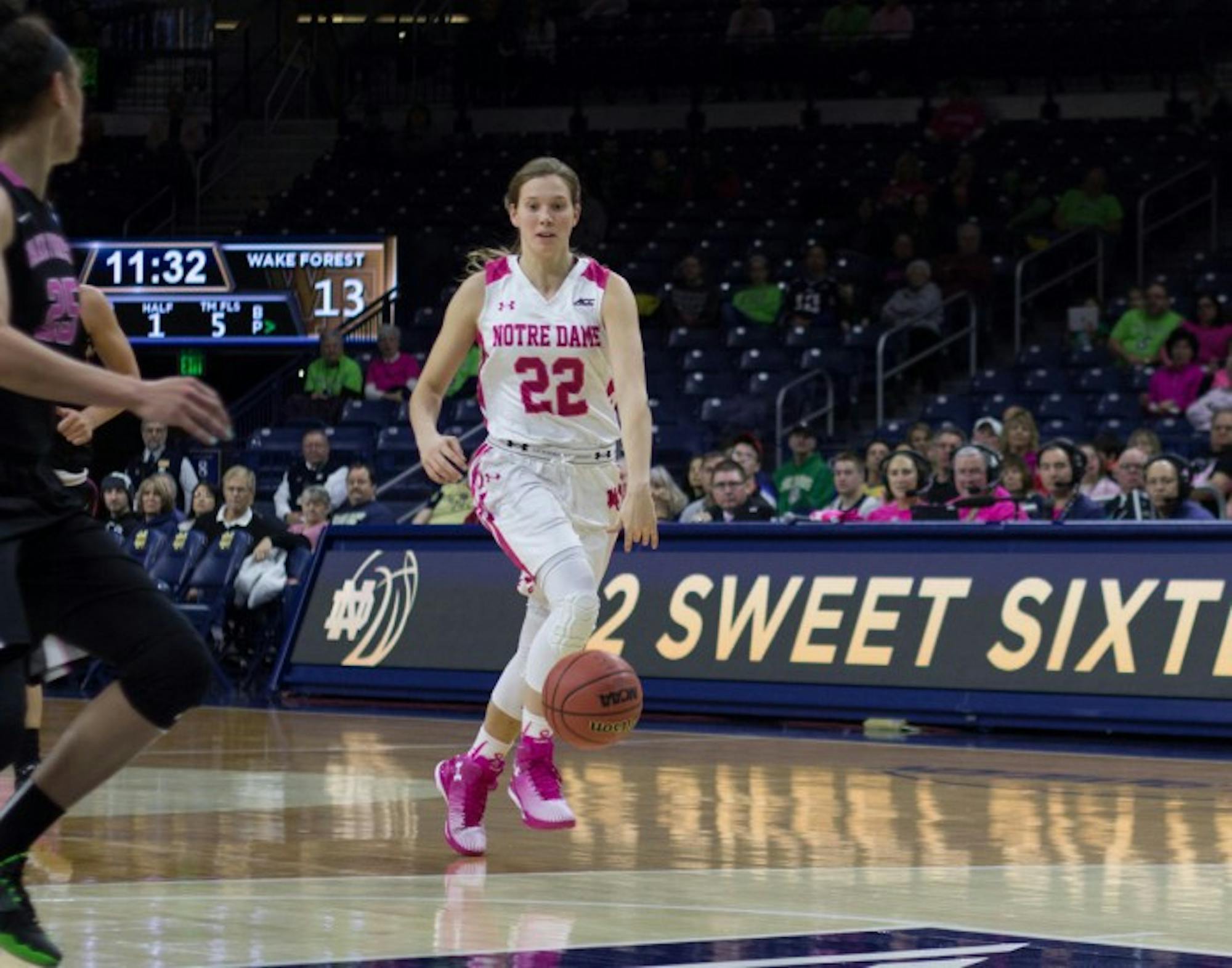 Irish senior guard Madison Cable makes her way up the court during Notre Dame's 92-63 win over Wake Forest on Sunday. Cable set a career-high in steals during the game, with six.