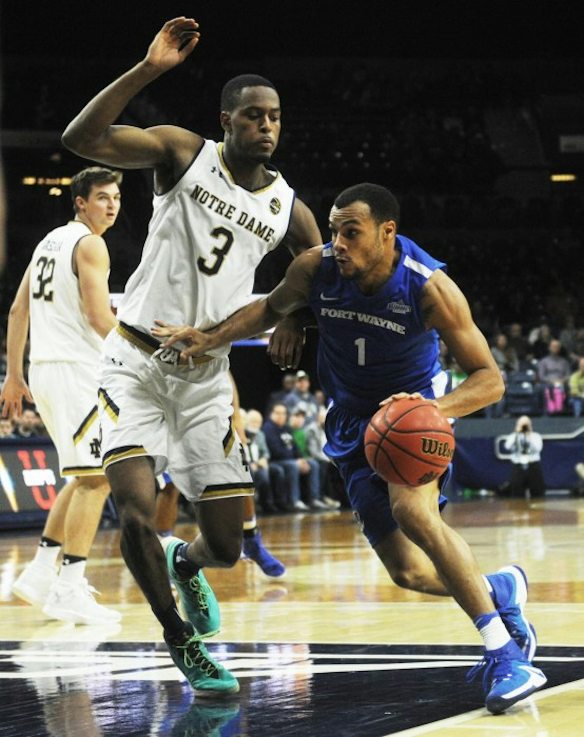 Irish senior forward V.J. Beachem guards a ball-handler during Notre Dame 's 87-72 victory over Ft. Wayne on Dec. 6 at Purcell Pavilion.