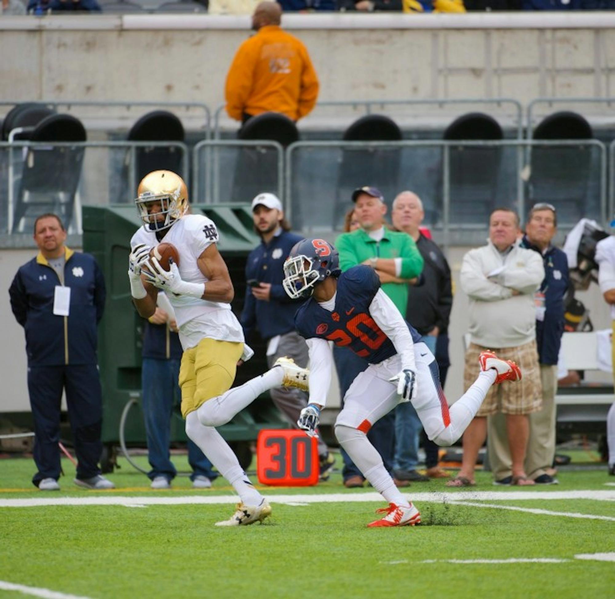 Irish sophomore receiver Equanimeous St. Brown hauls in a pass down the field during Notre Dame's 50-33 win over Syracuse on Saturday at MetLife Stadium.