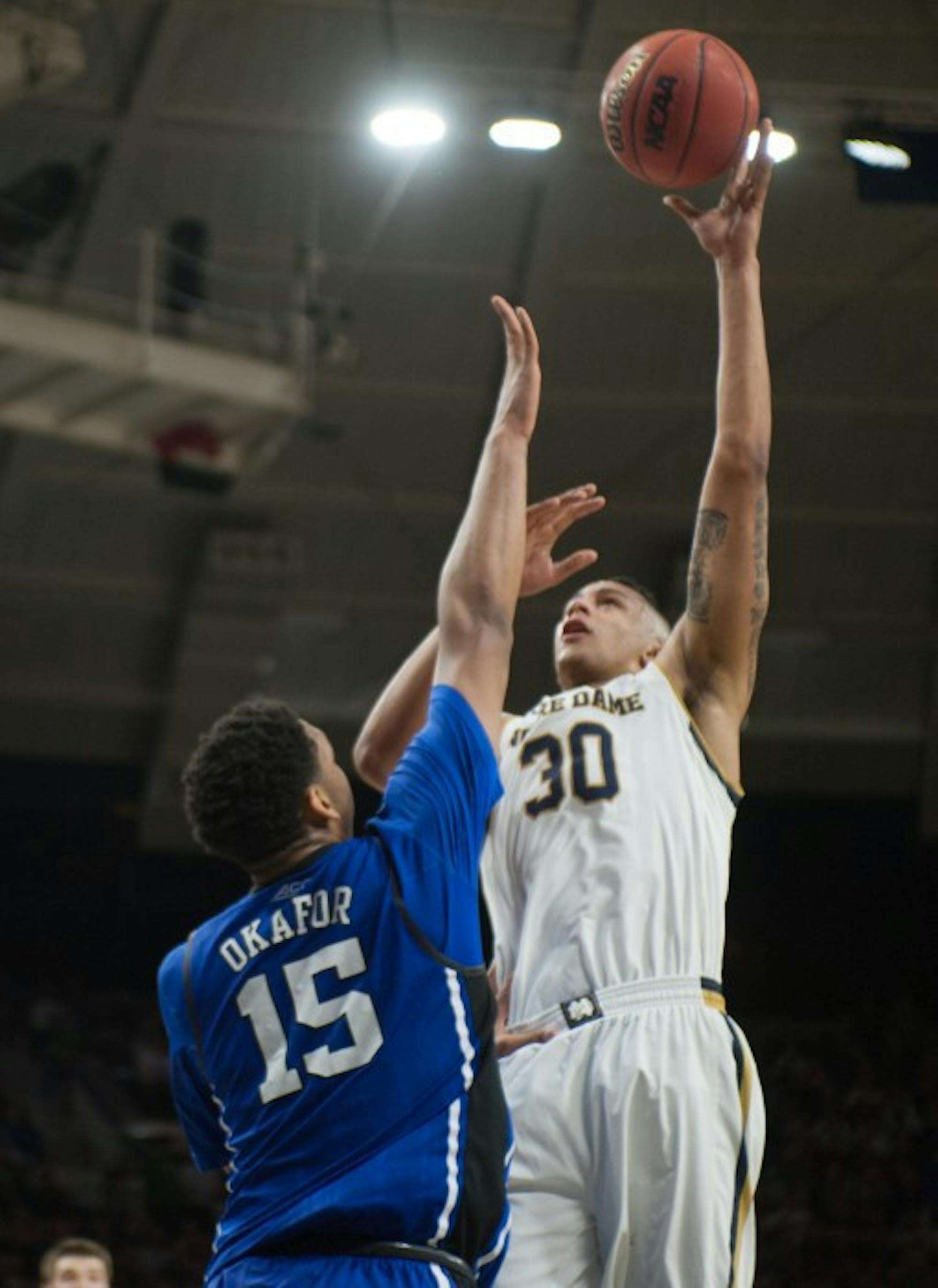 Irish junior forward Zach Auguste puts up a shot during Notre Dame’s 77-73 win over Duke on Jan. 28 at Purcell Pavilion.